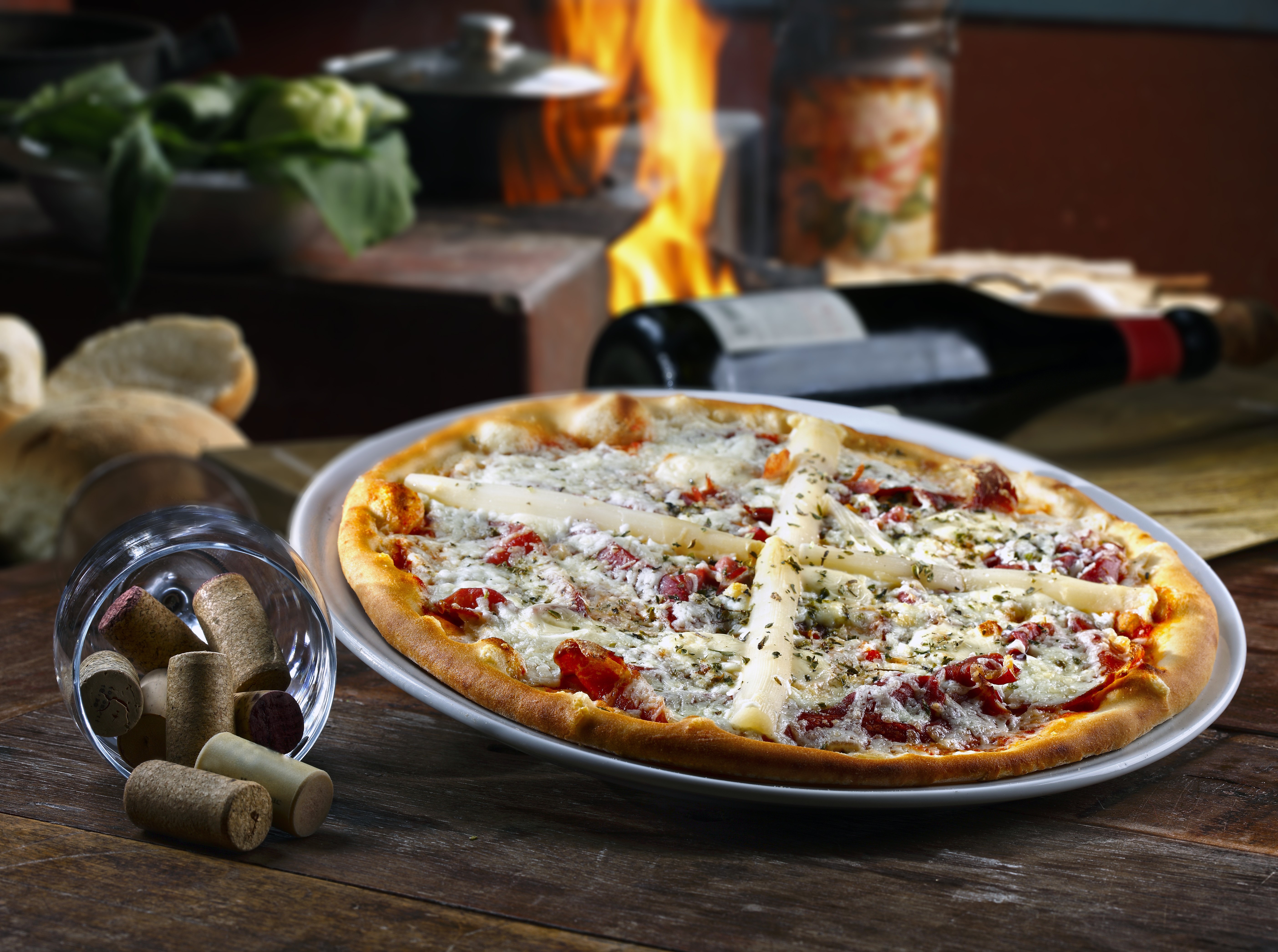 Pizza with asparagus and tomatoes on a plate HD Wallpaper