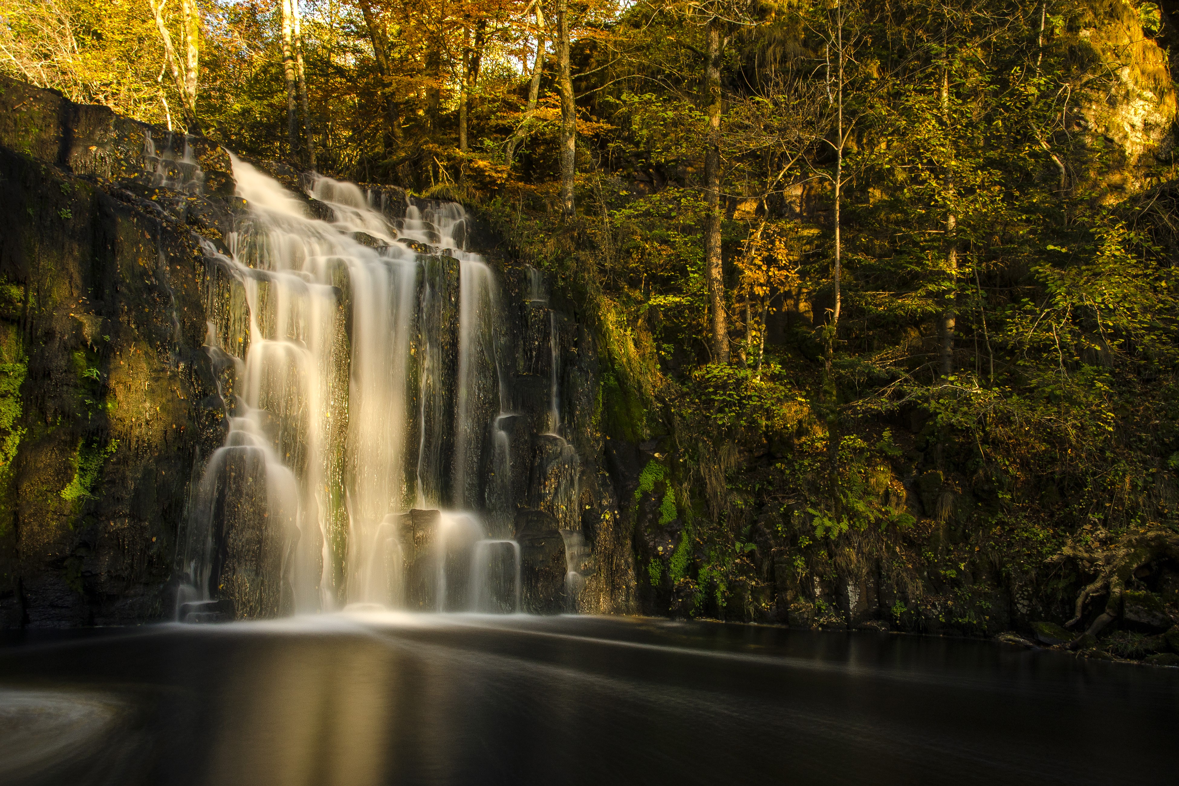 Waterfall in Autumn Forest with Mossy Crags HD Wallpaper