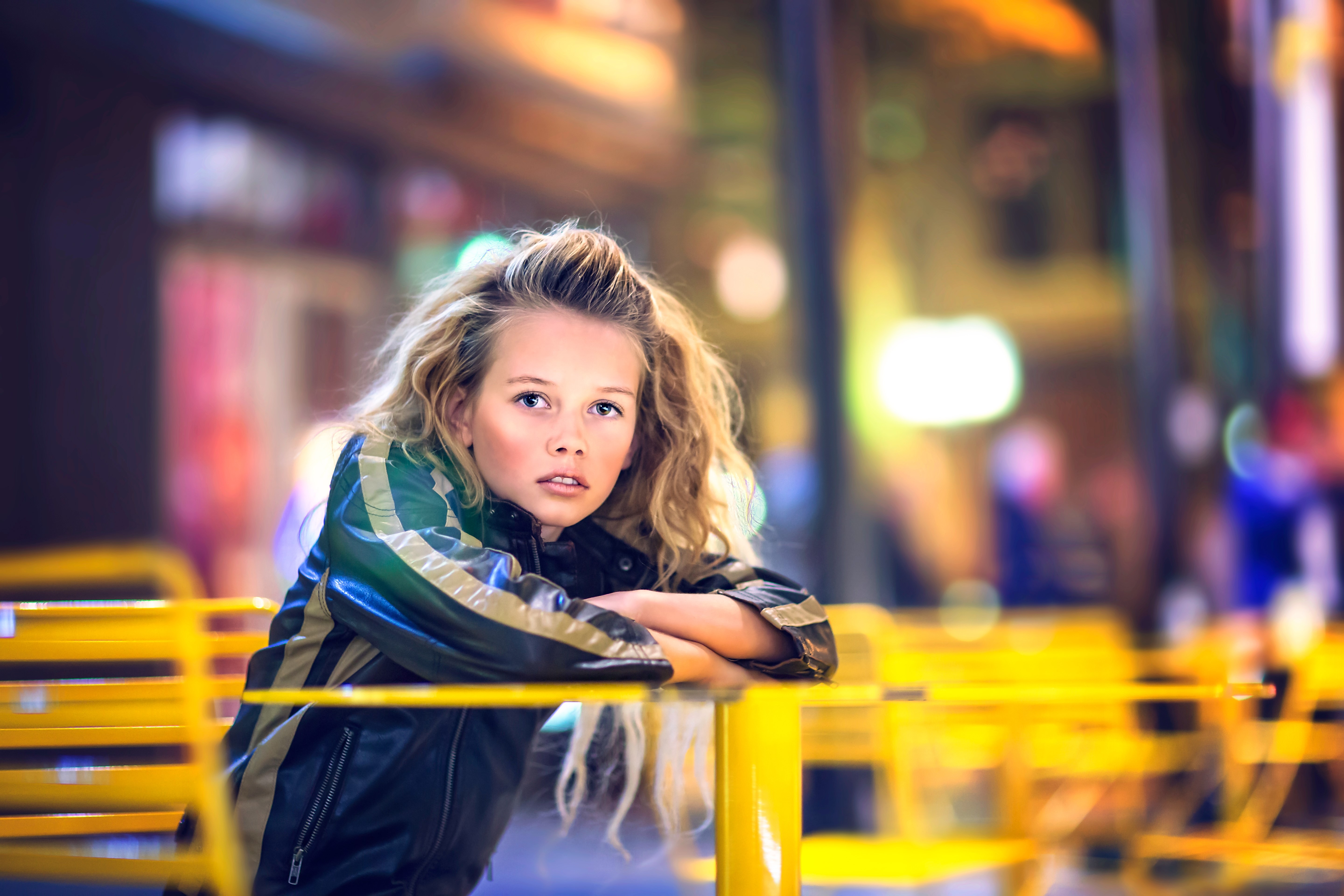 Girl sitting at a table HD Wallpaper