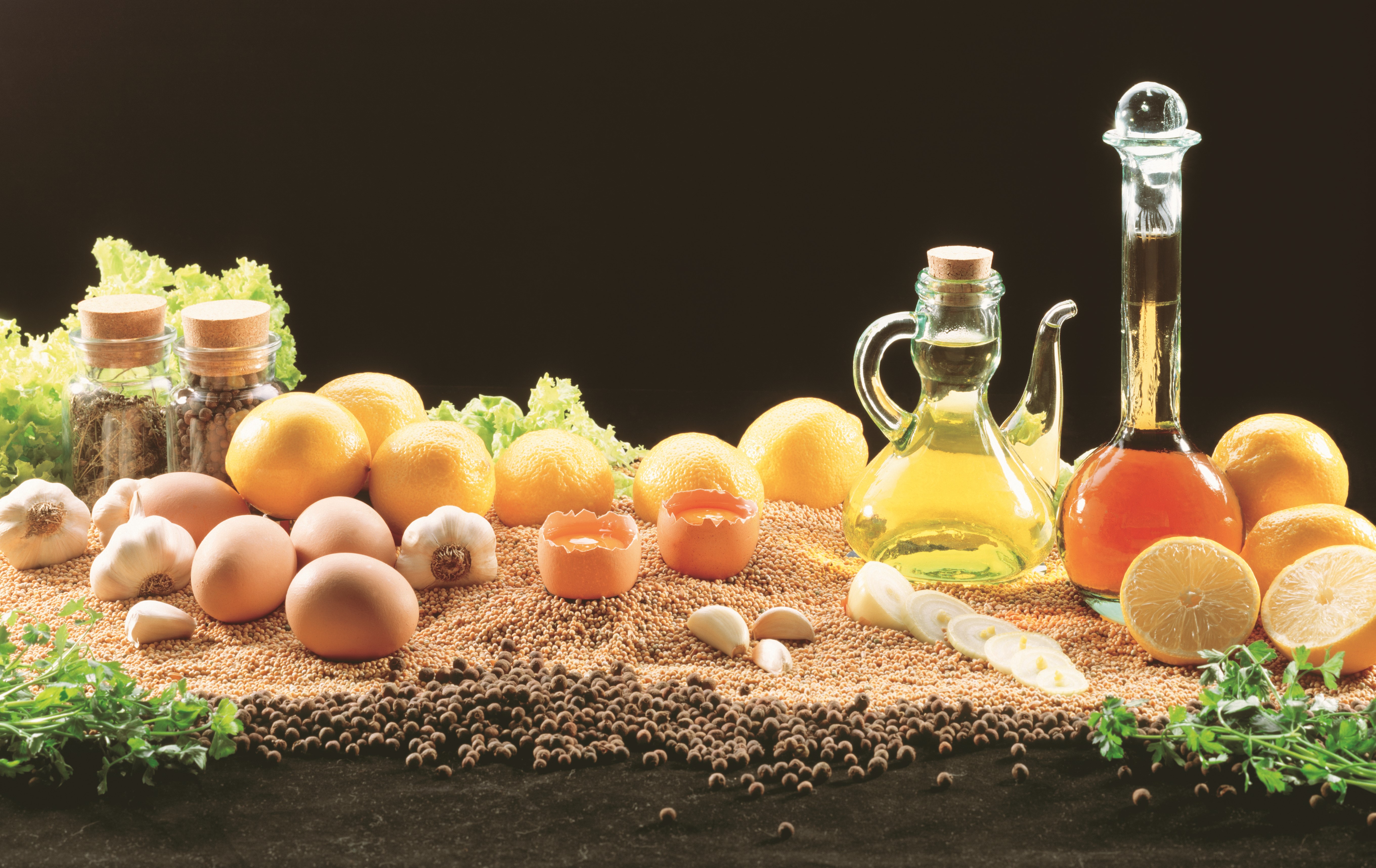 Still-life of lemons, eggs, garlic, and spices HD Wallpaper