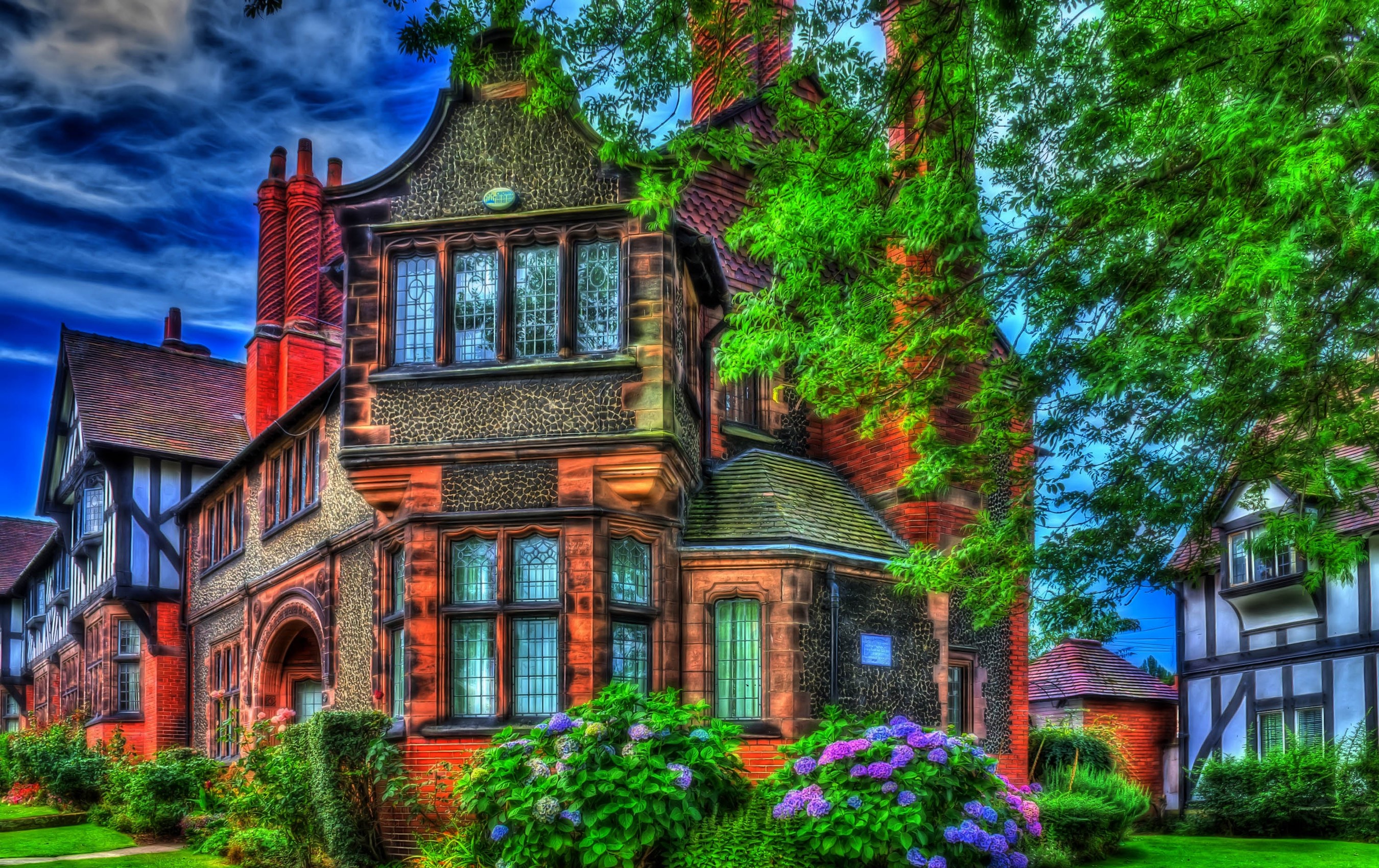 Tudor-style houses with hydrangeas in Bebington, England HD Wallpaper