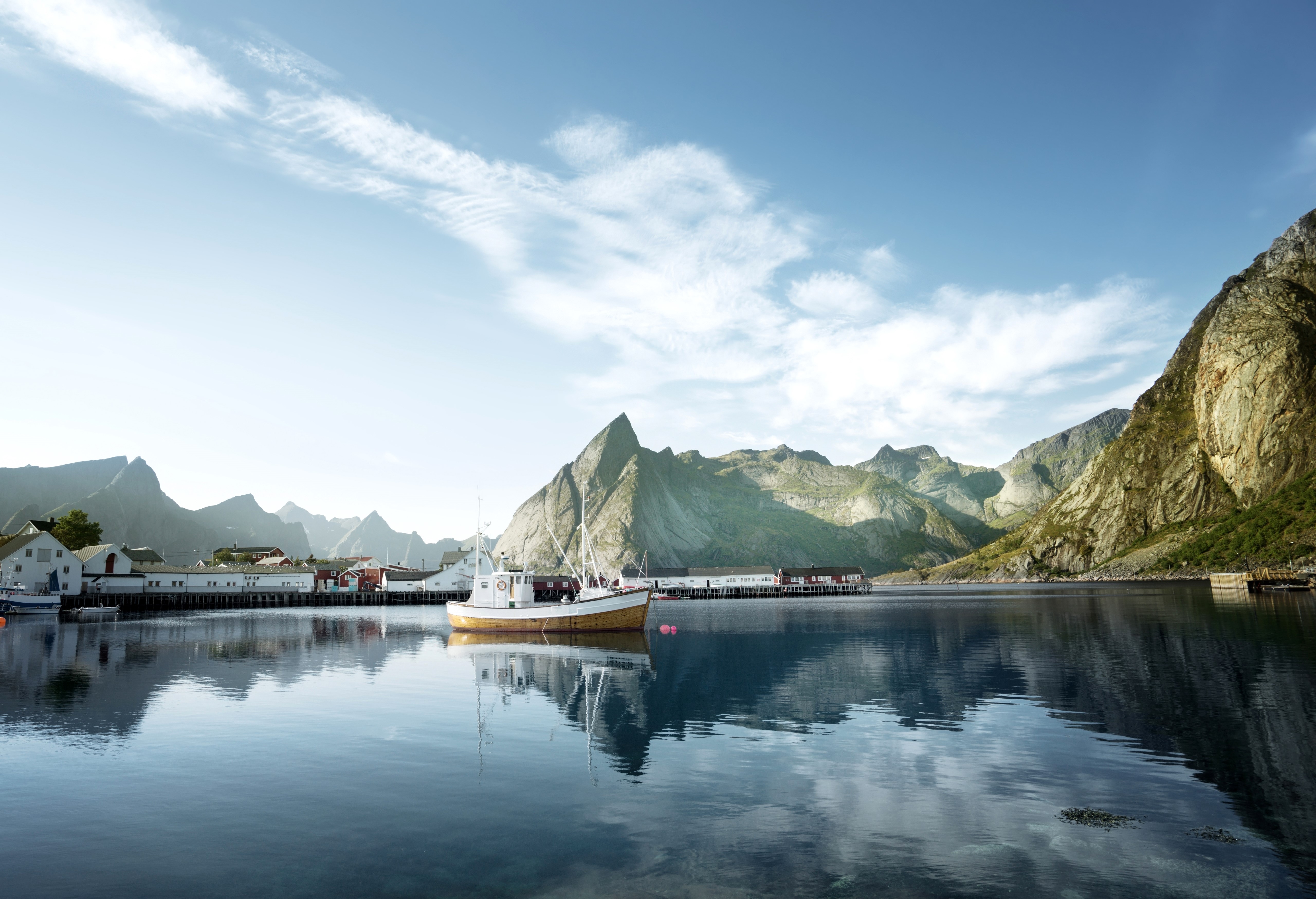 Fishing boat in a Norwegian fjord with mountains HD Wallpaper