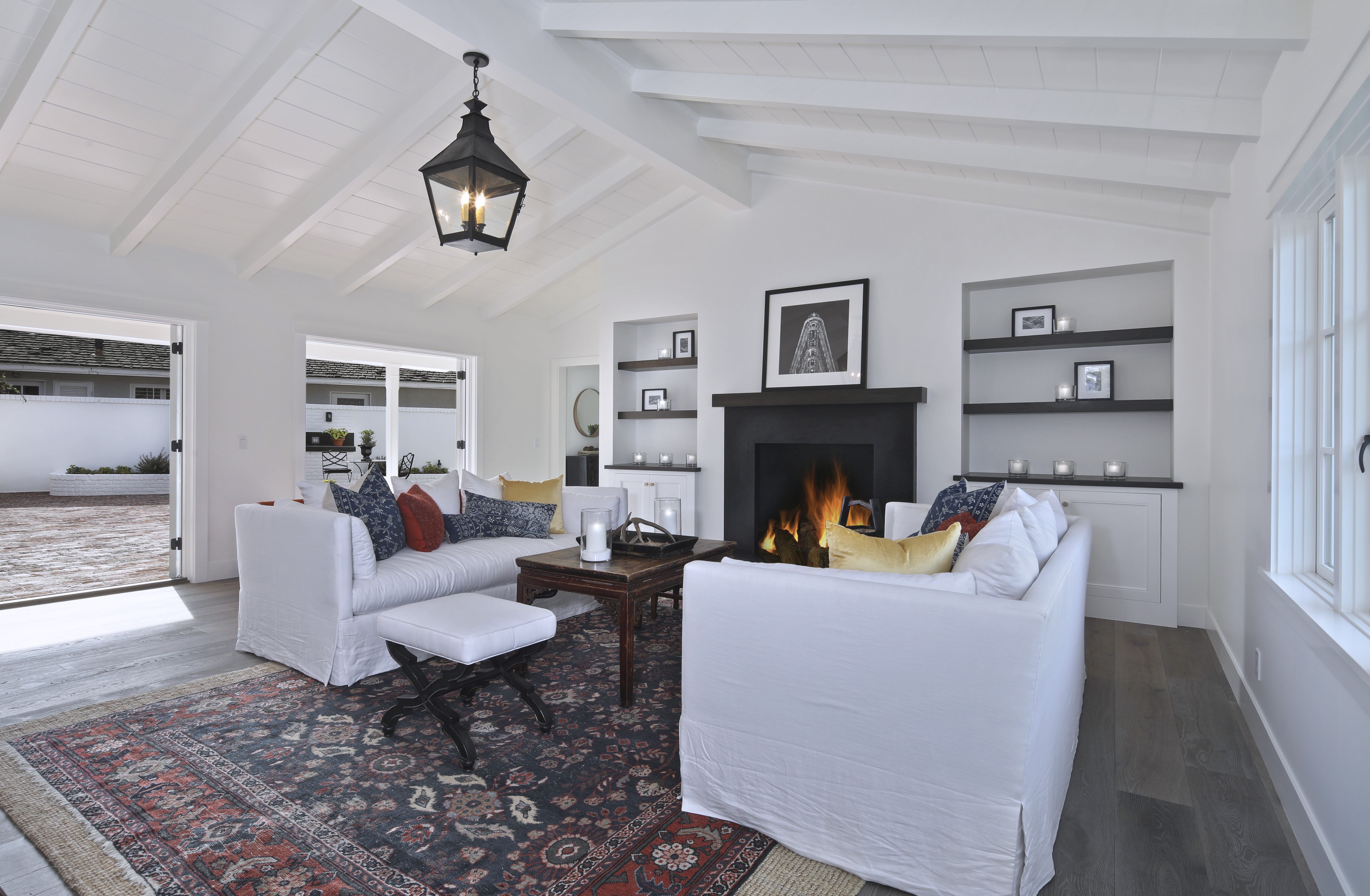 Living room with sofas and fireplace HD Wallpaper