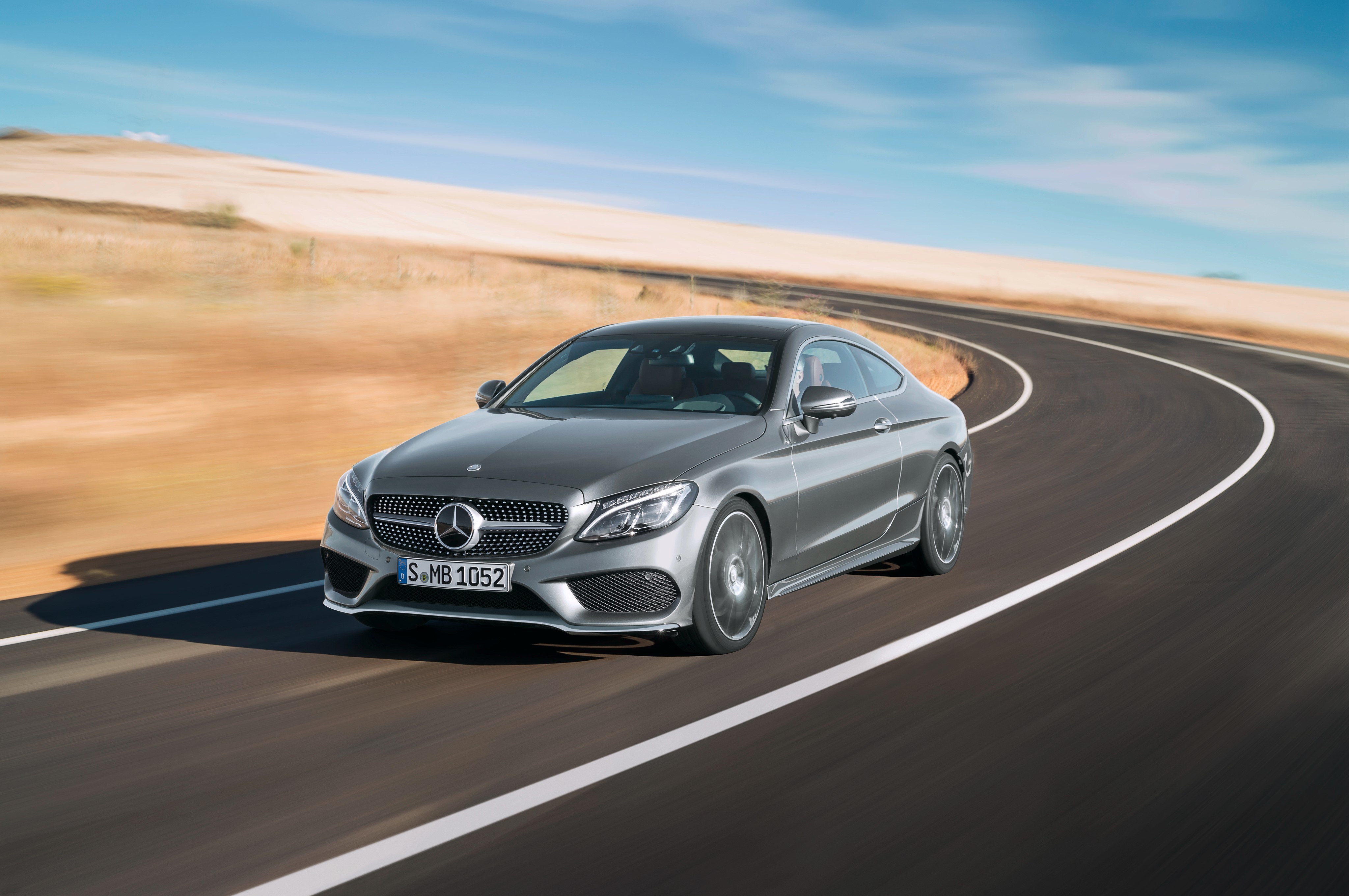 Mercedes-Benz C-Class Coupe C205 on a Winding Road HD Wallpaper