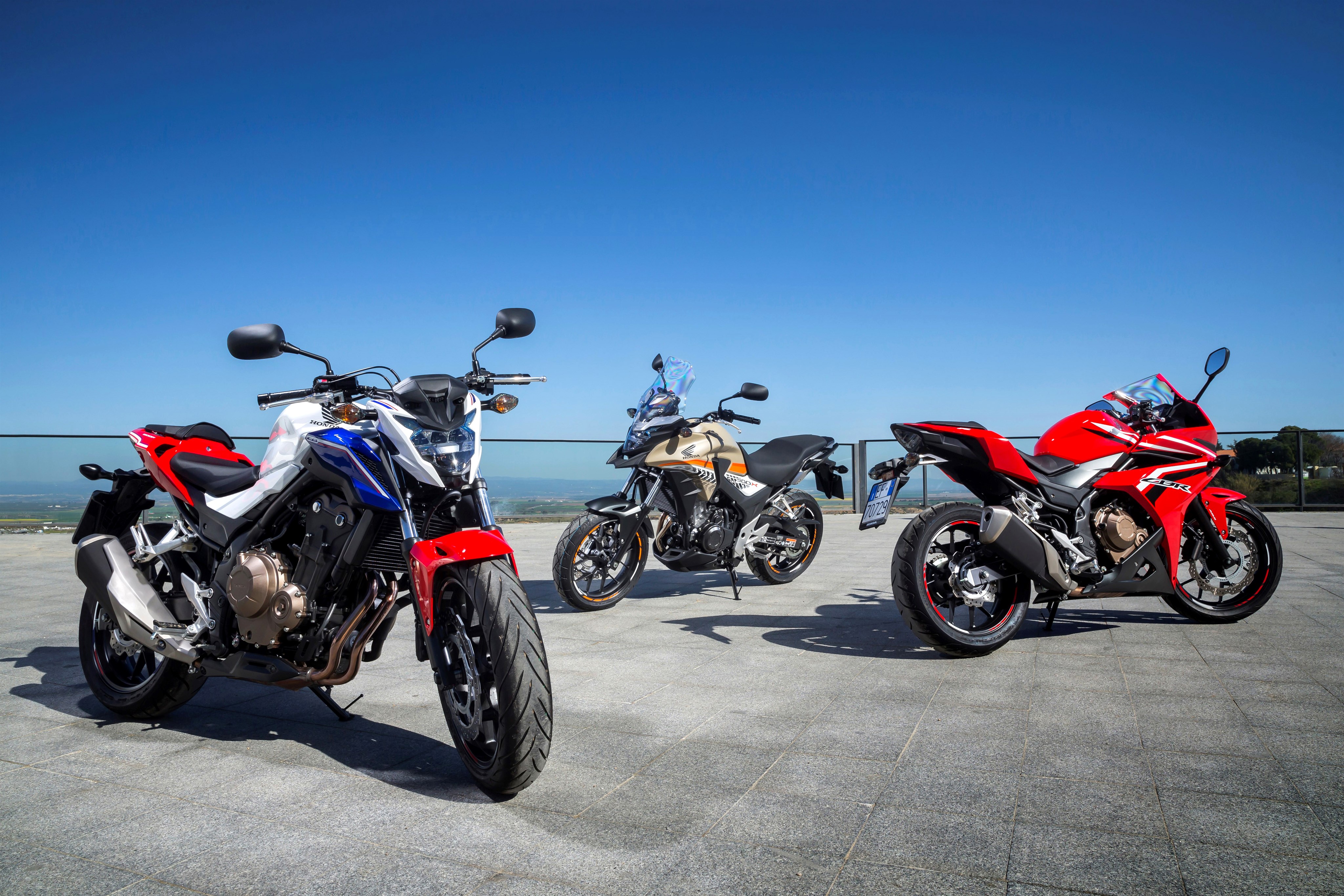 Three Honda Motorcycles on a Sunny Day HD Wallpaper