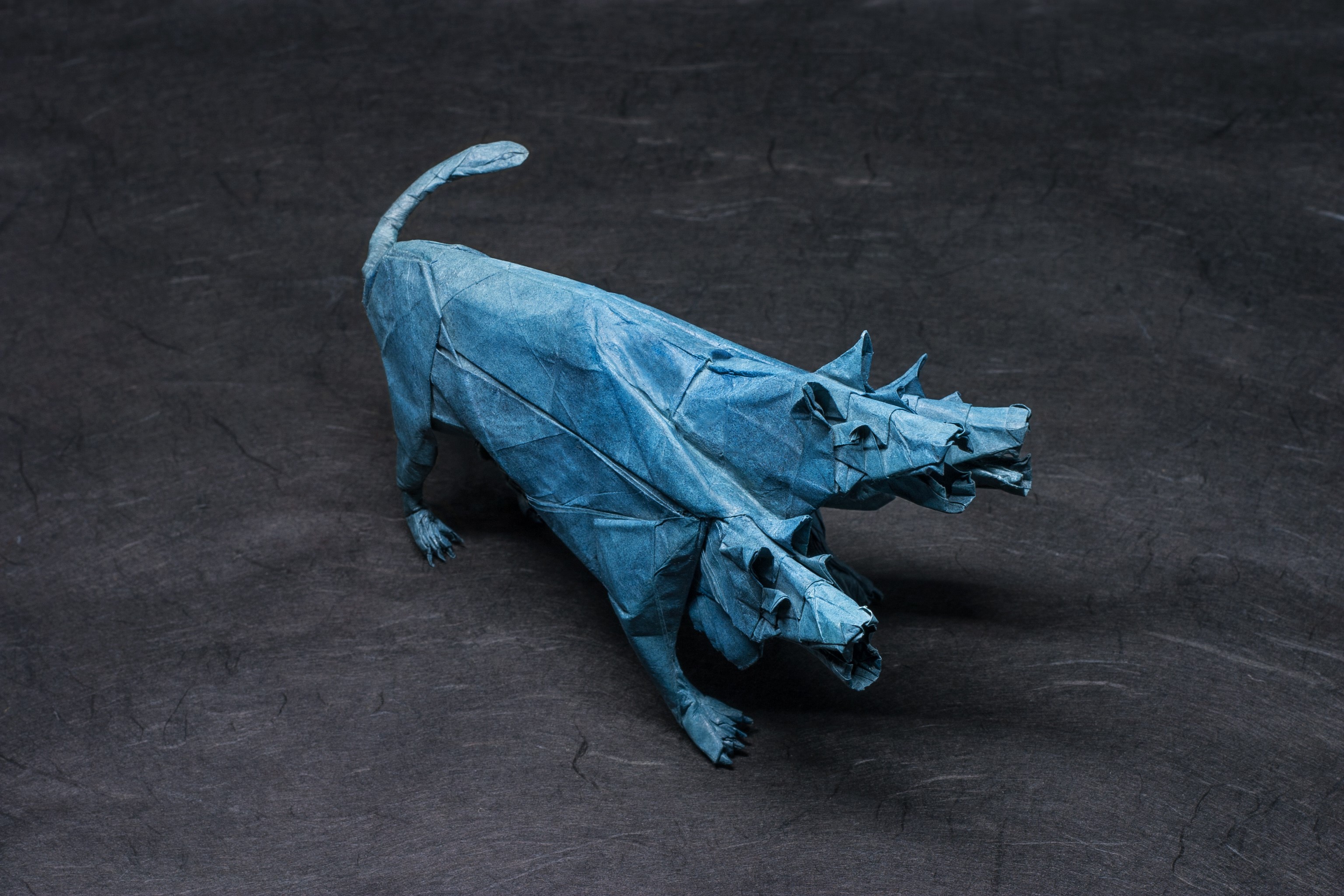 Blue origami Cerberus on a dark background HD Wallpaper