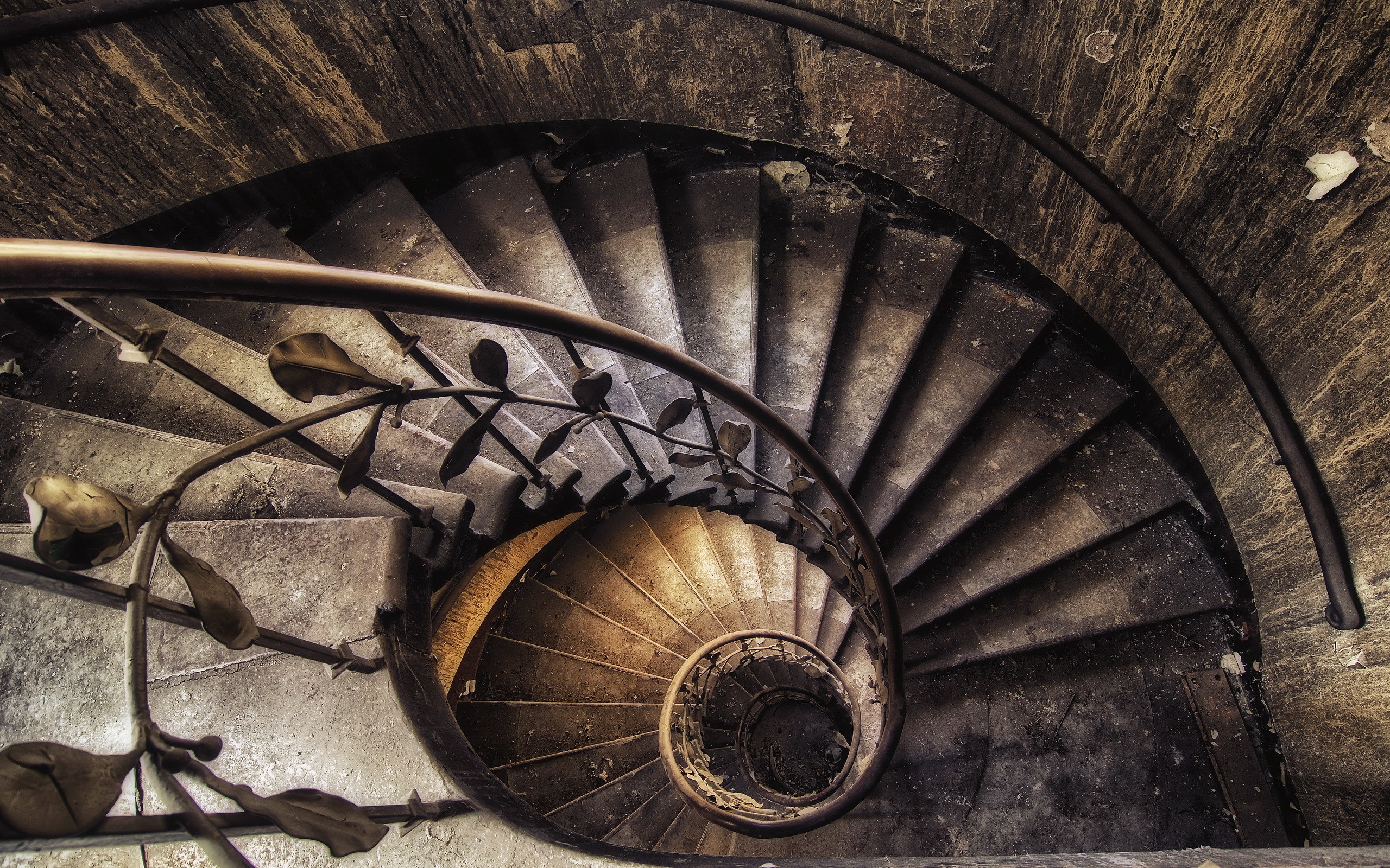 Retro spiral staircase with ornate railing HD Wallpaper