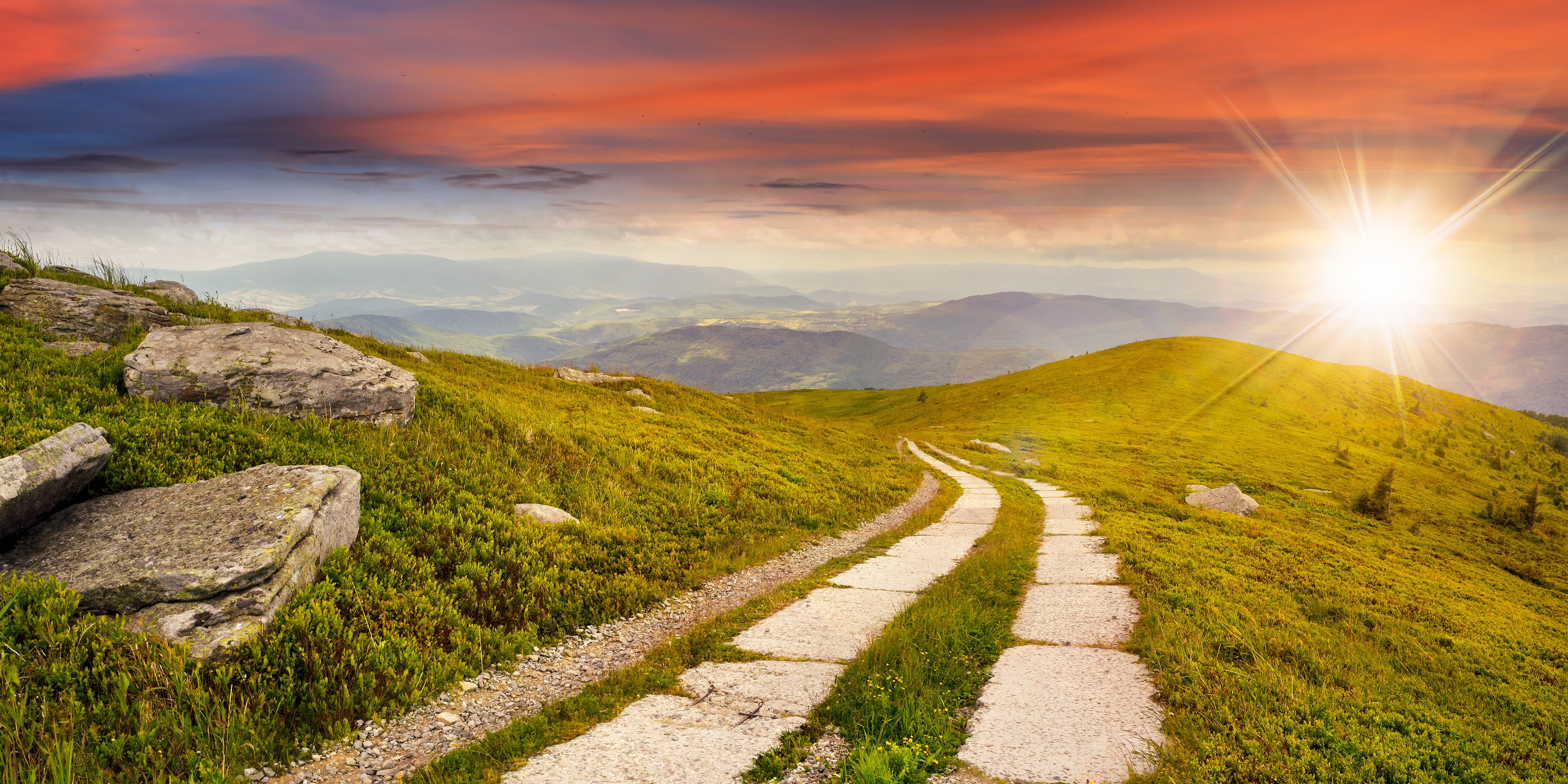 Mountain road with sun rays at sunset HD Wallpaper