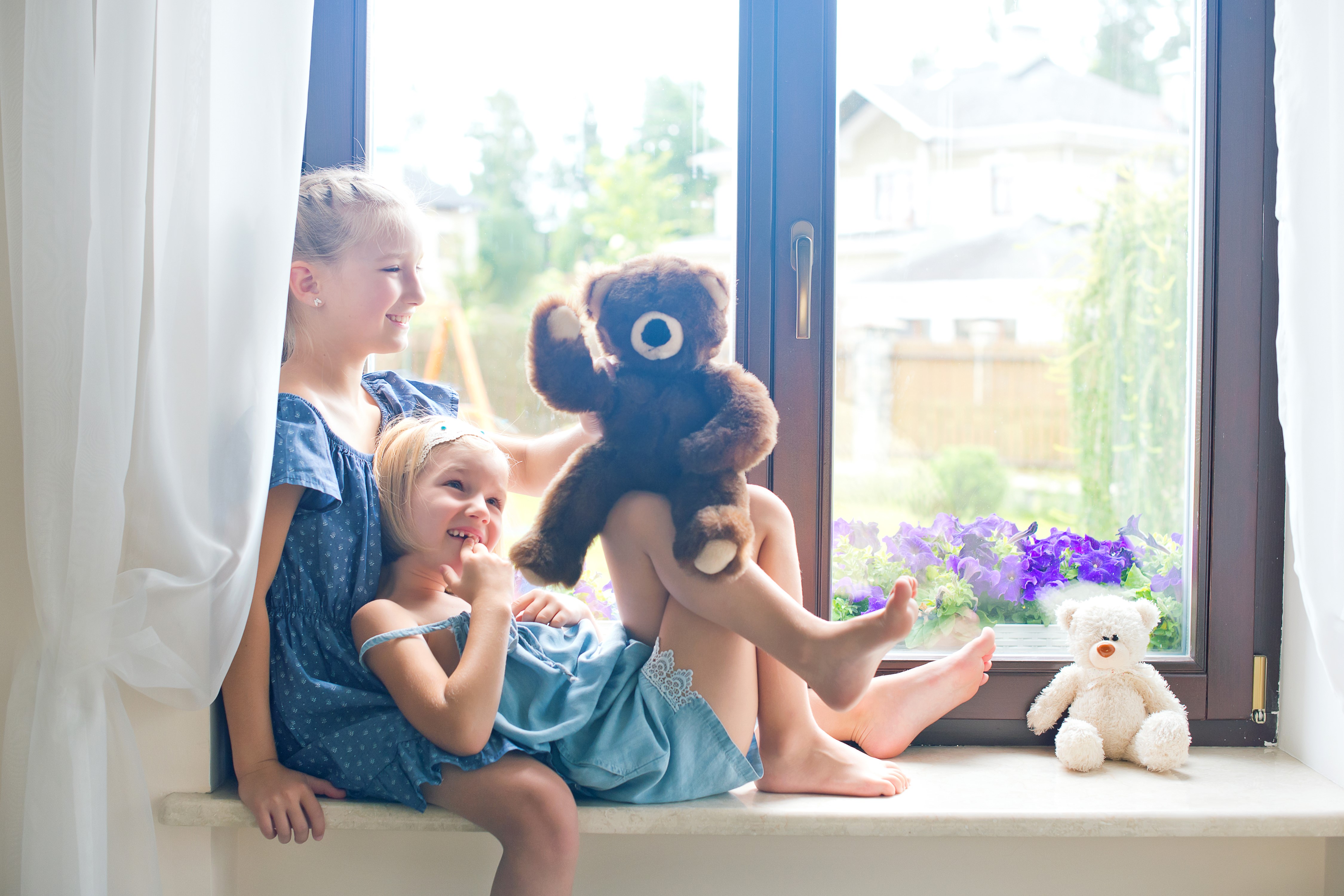 Two little girls with teddy bears by the window HD Wallpaper