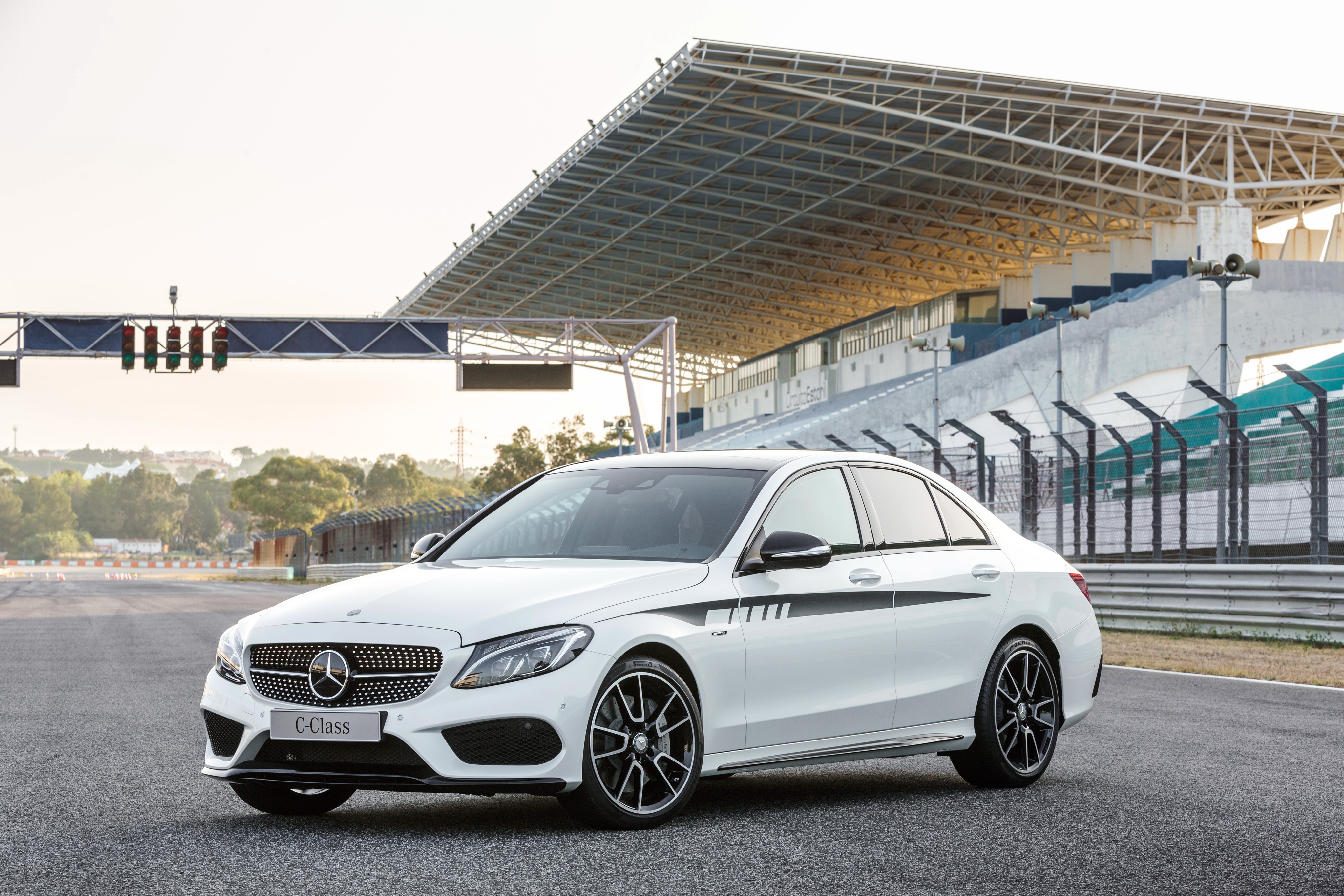 White Mercedes-Benz C-Class C 450 AMG Sport on Racetrack HD Wallpaper