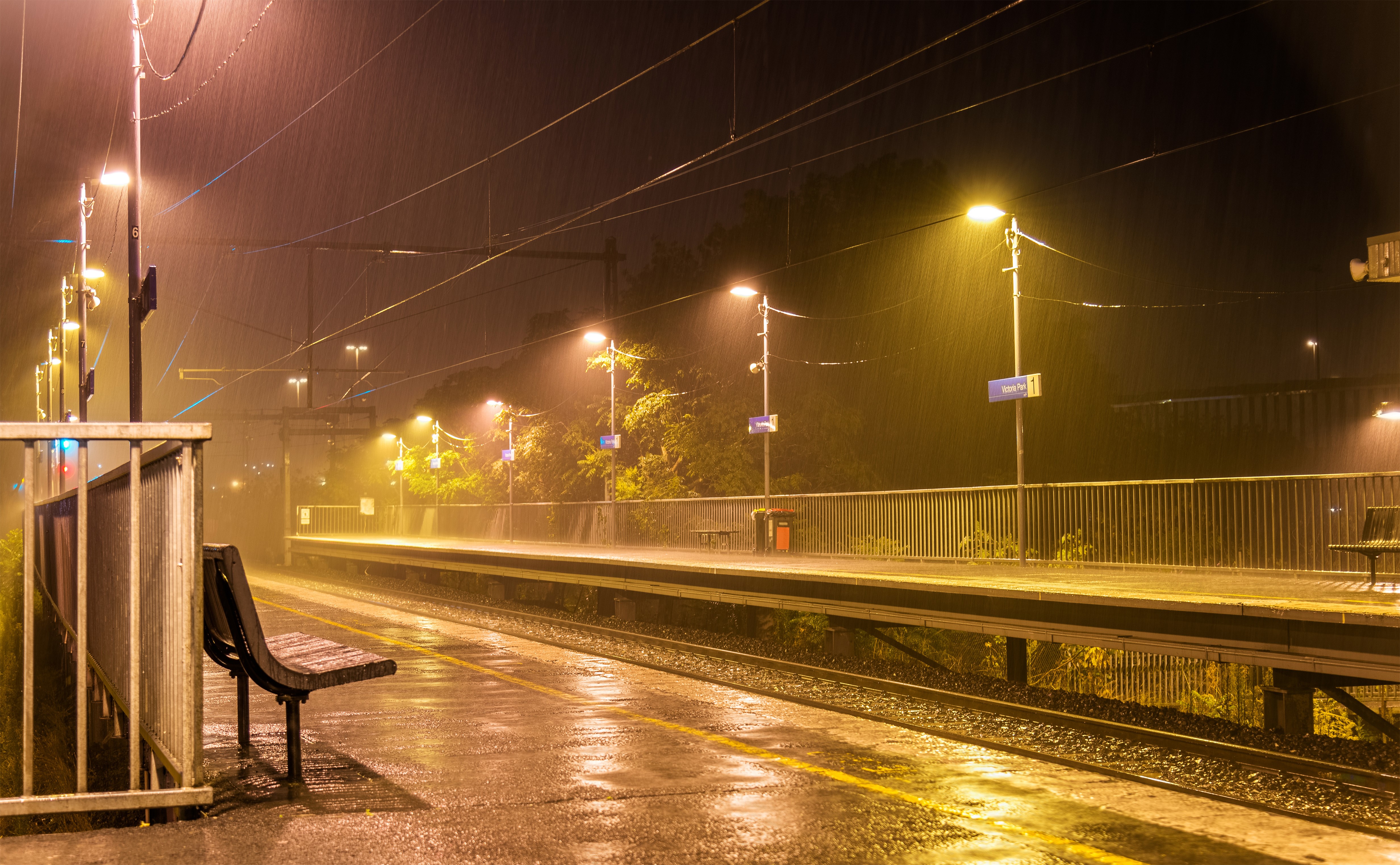 Train station at night in the rain, Melbourne, Australia HD Wallpaper