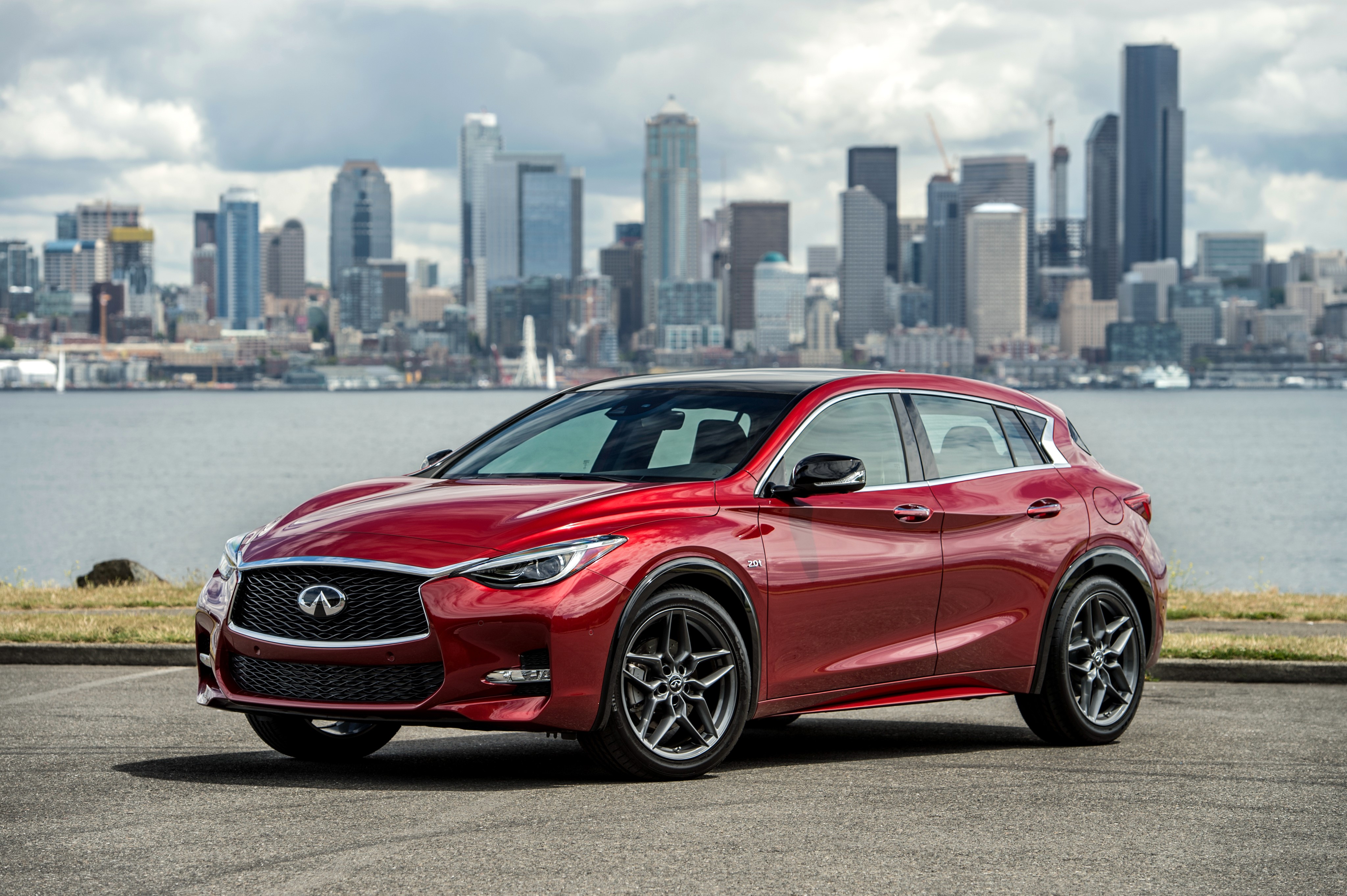 Red 2017 Infiniti QX30S 2.0t with Seattle Skyline HD Wallpaper