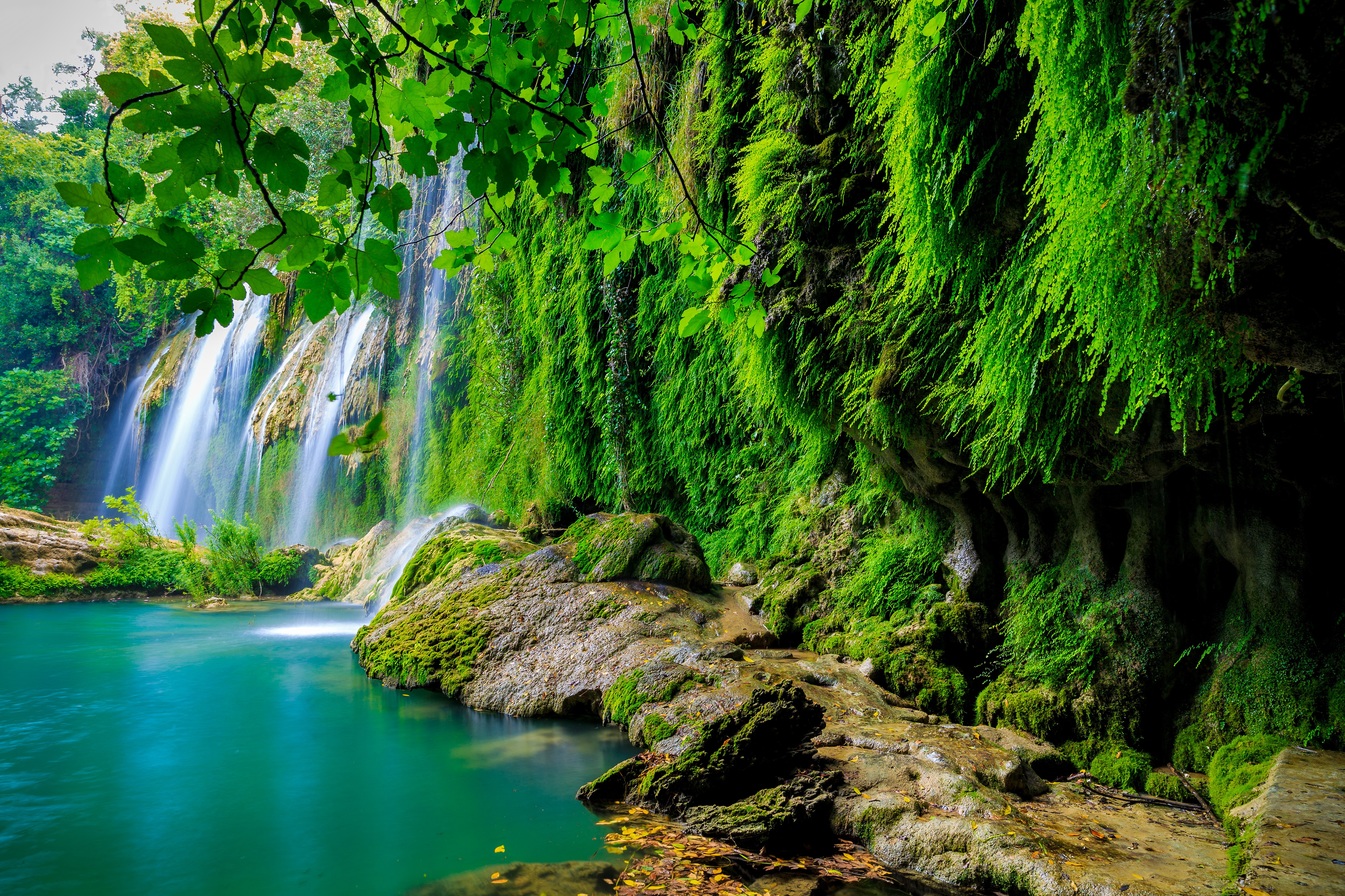 Serene 4K Waterfall with Lush Green Moss HD Wallpaper