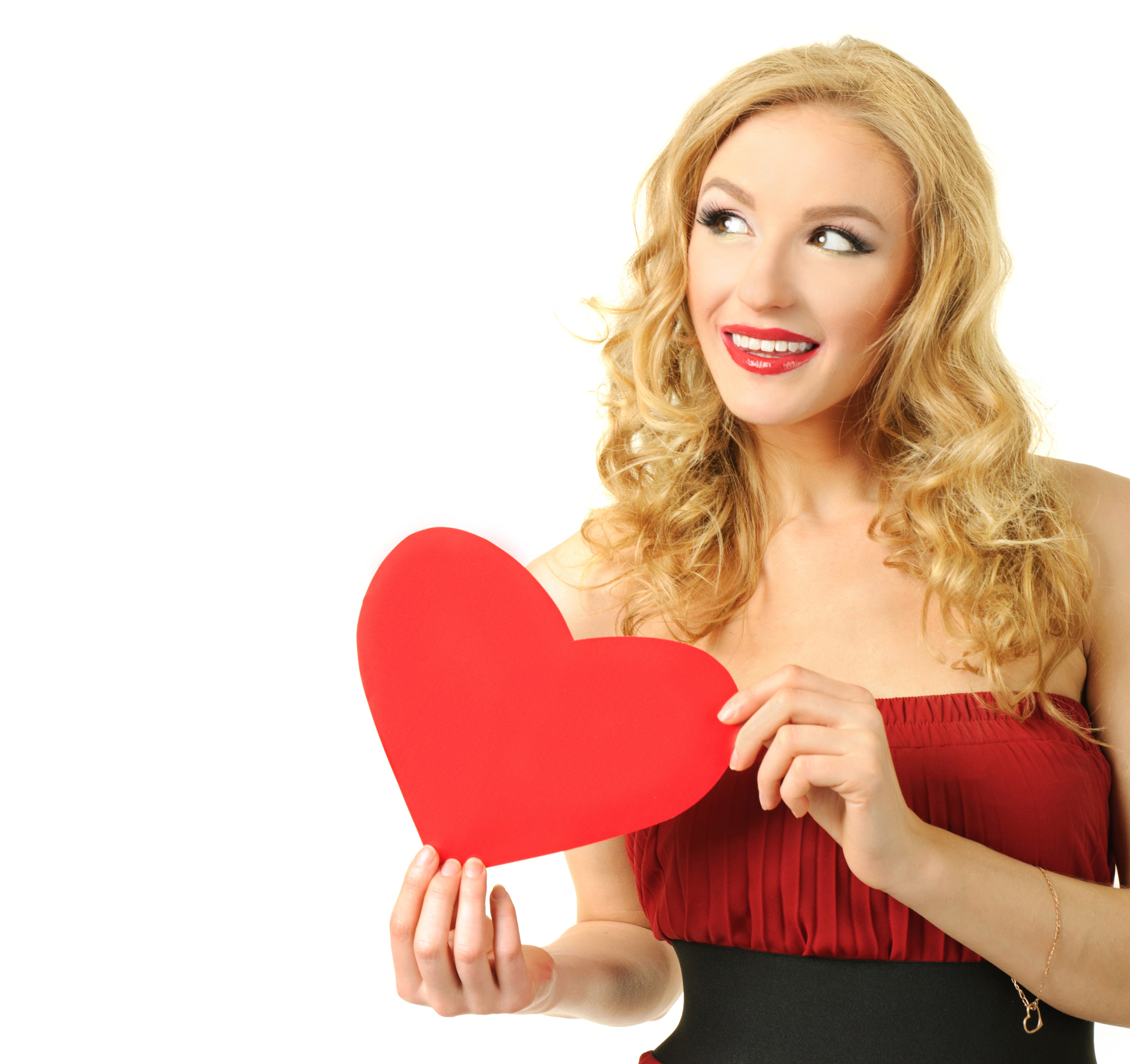 Blonde girl holding a red heart on white background HD Wallpaper