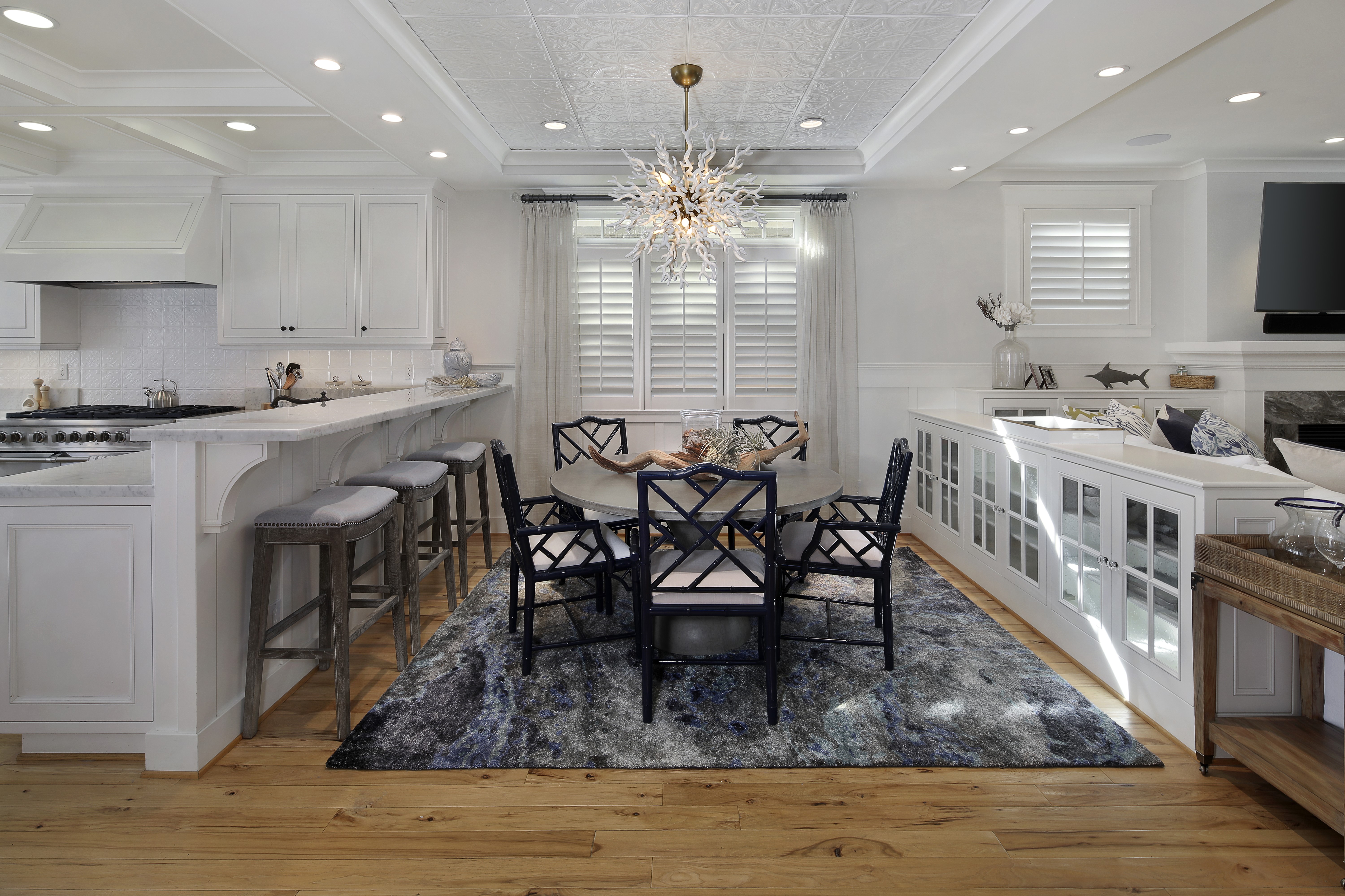 Kitchen and Dining Area with Chandelier and Chairs HD Wallpaper