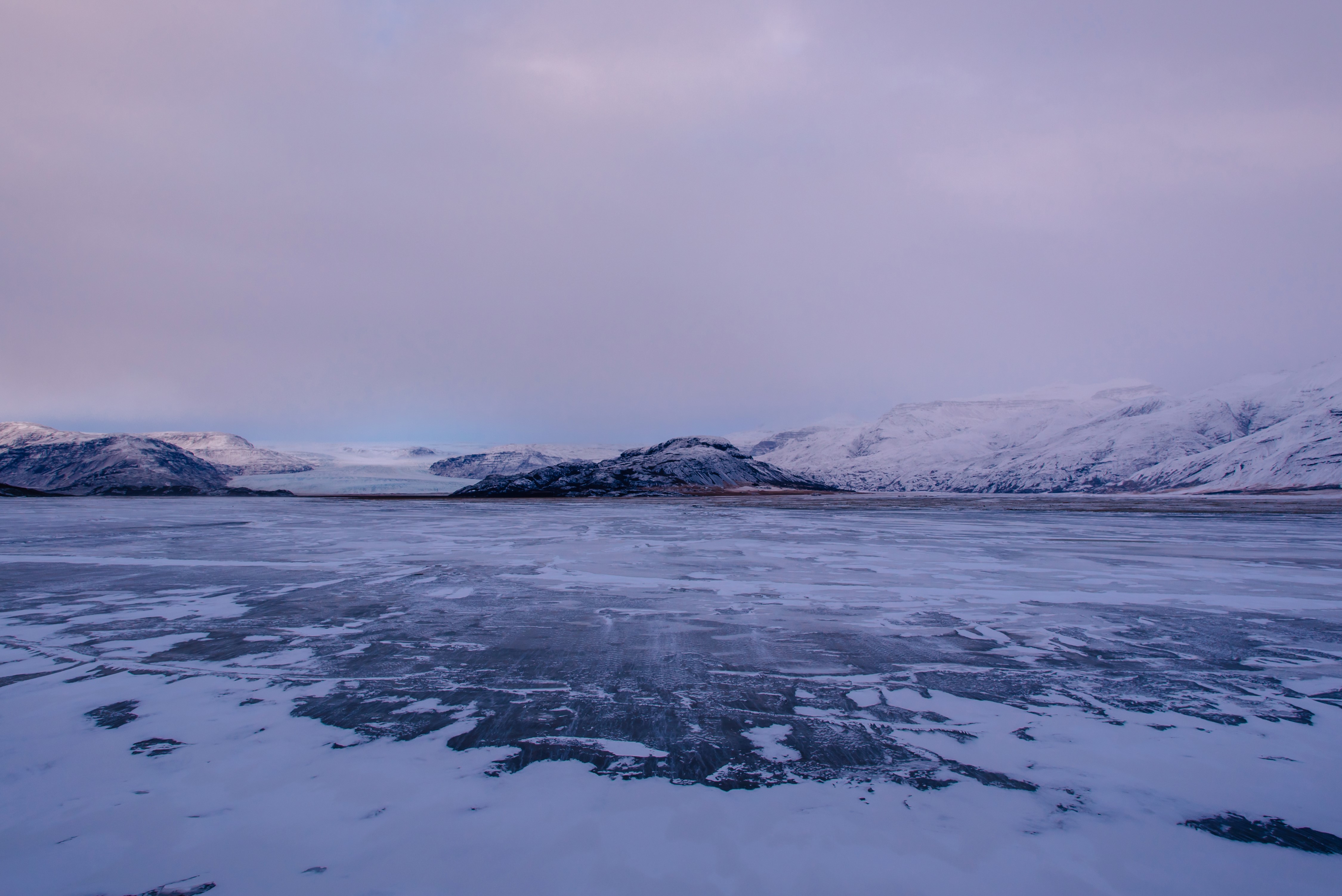 Icelandic Winter Landscape with Mountains and Frozen Lake HD Wallpaper