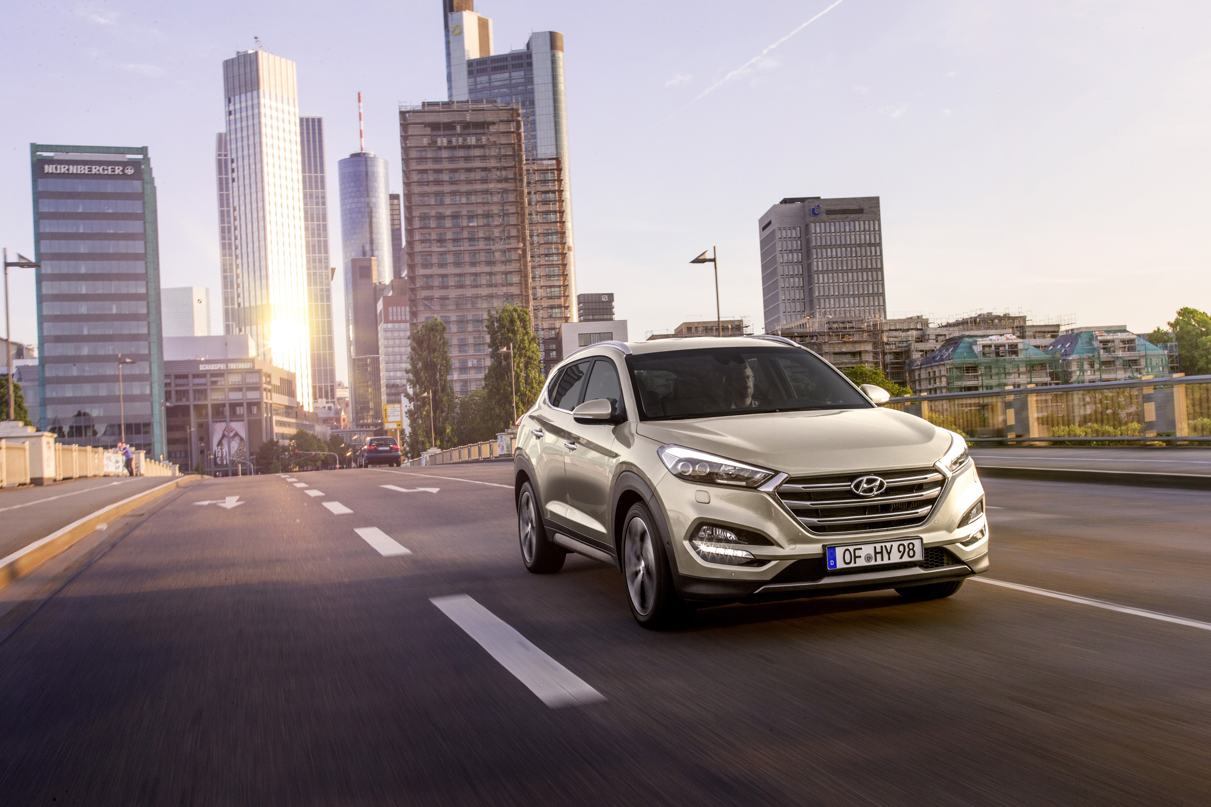 2015 Hyundai Tucson on a City Road HD Wallpaper