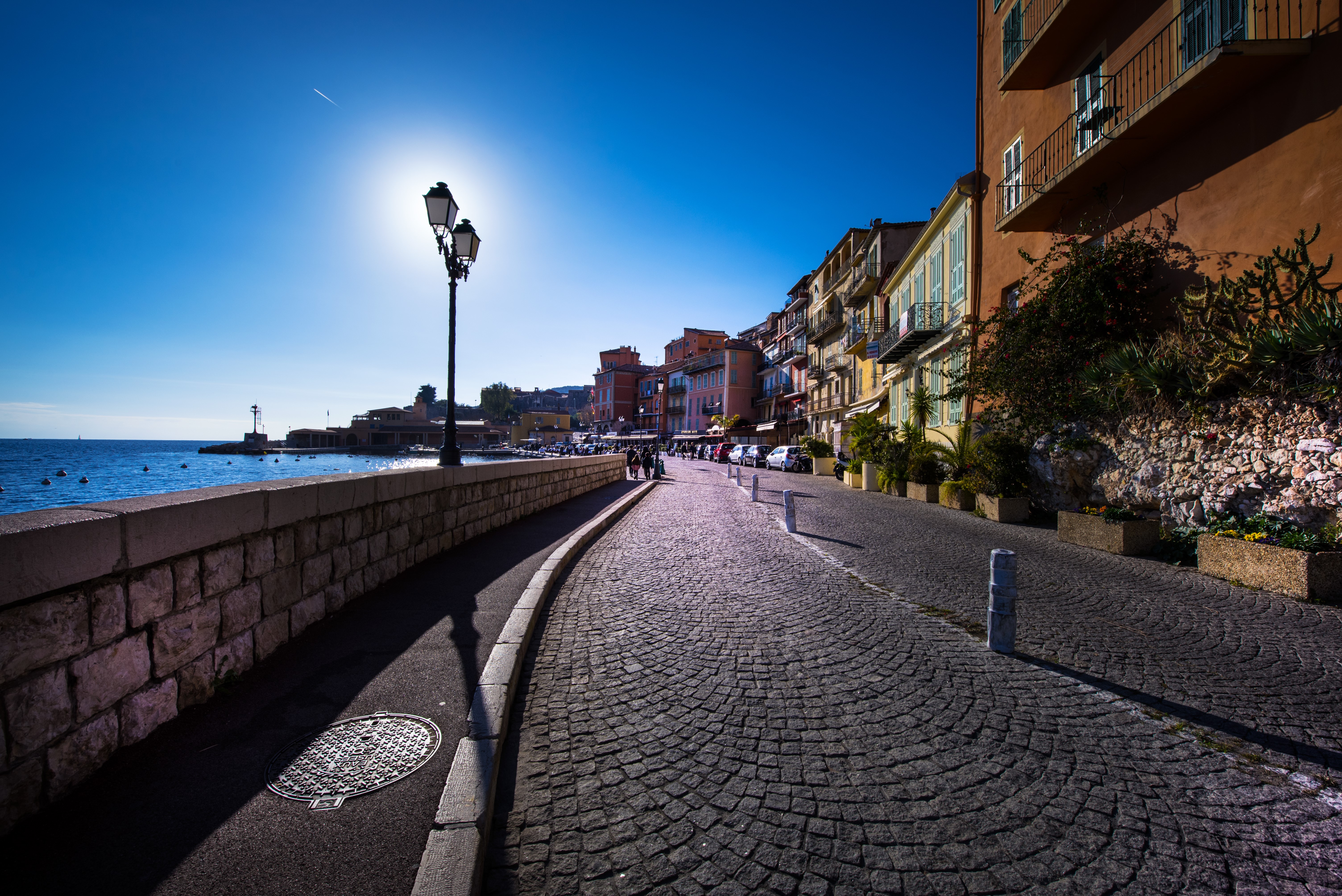 Villefranche sur Mer street with buildings and sea HD Wallpaper