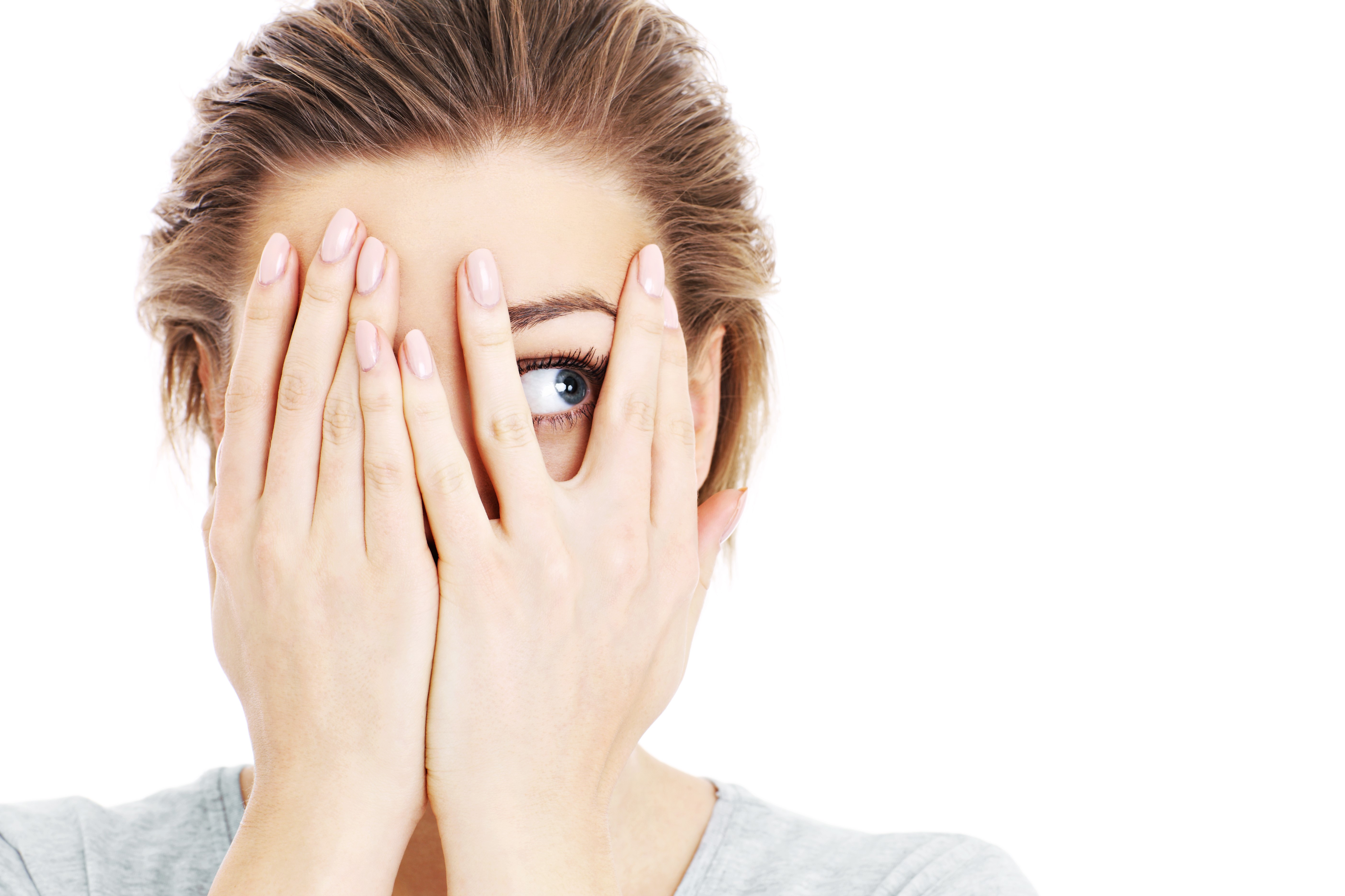 Woman peeking through her hands HD Wallpaper