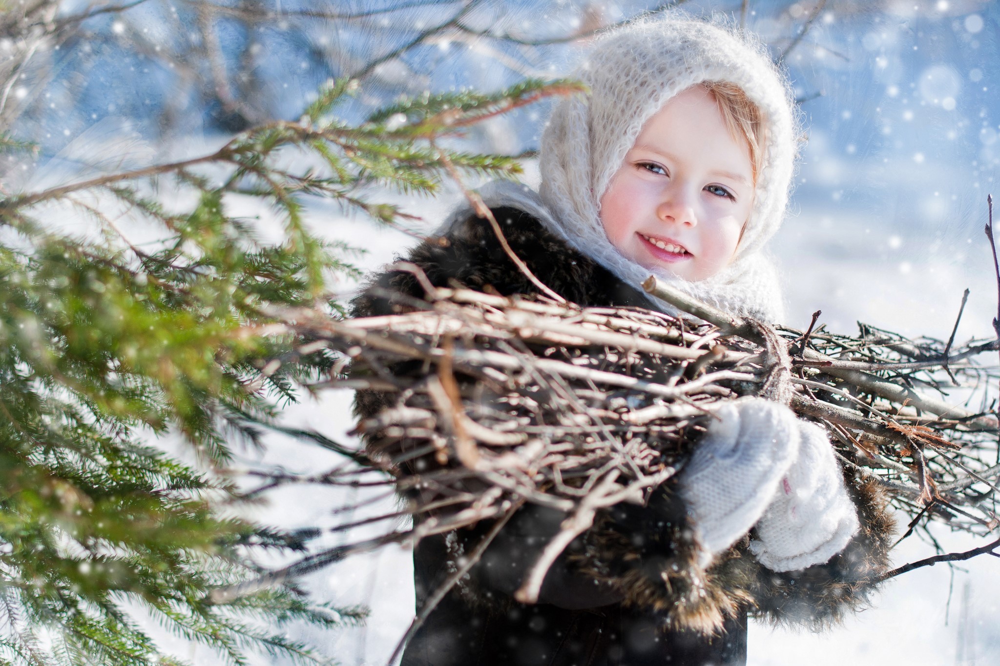 Girl in winter holding branches HD Wallpaper