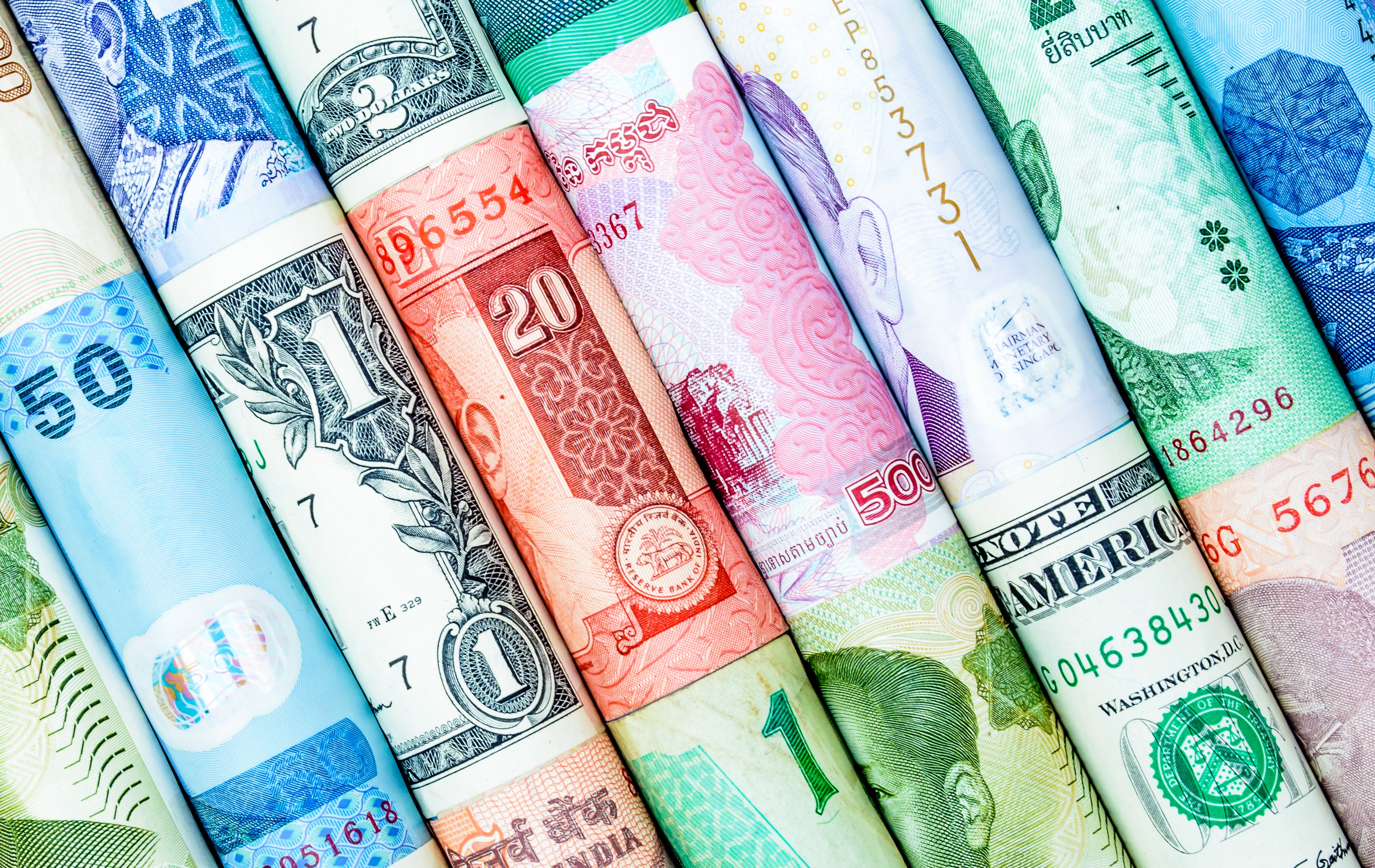 Rolled Banknotes from Various Countries HD Wallpaper