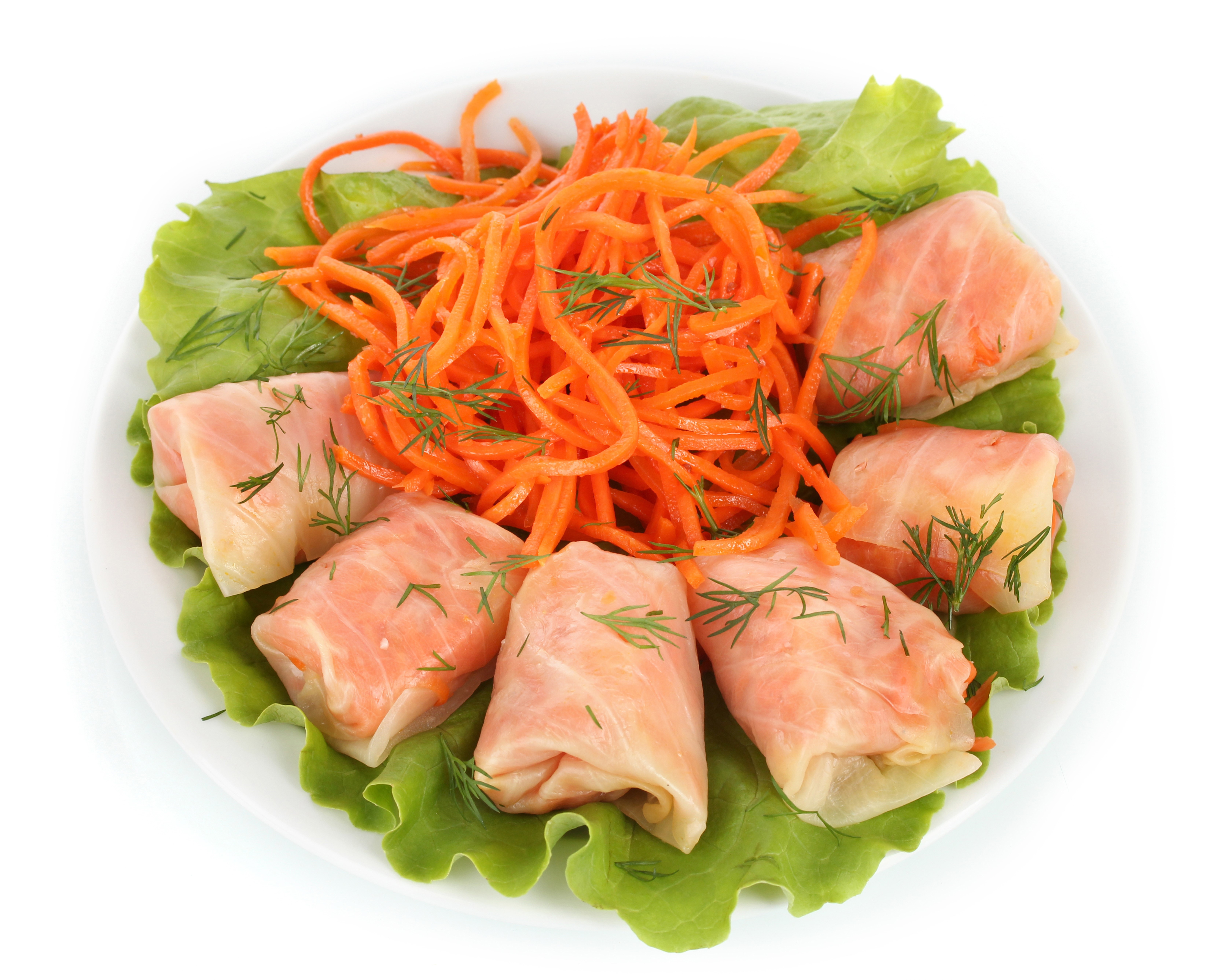 Stuffed cabbage rolls with shredded carrots and lettuce HD Wallpaper