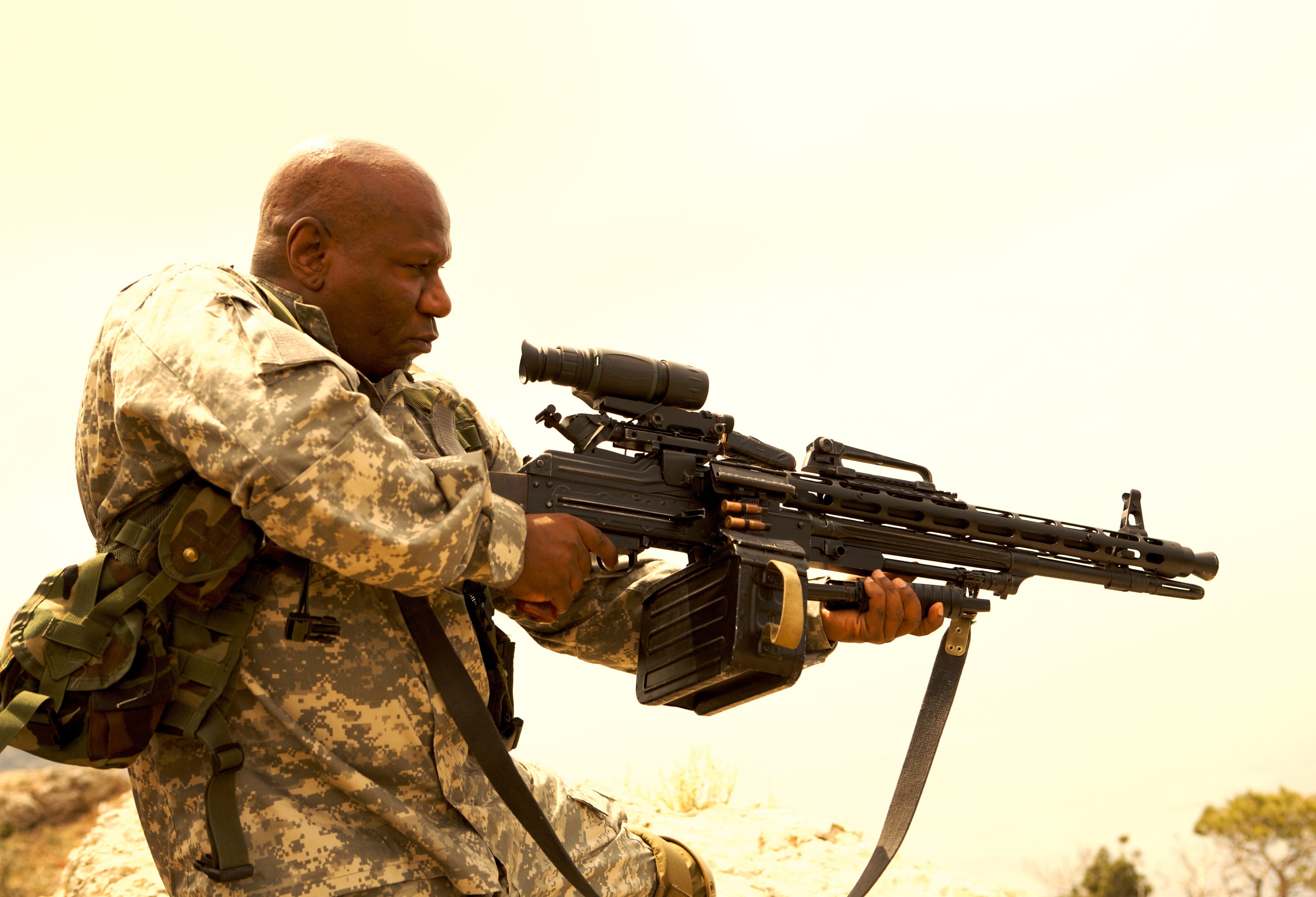4K Ving Rhames with Machine Gun HD Wallpaper