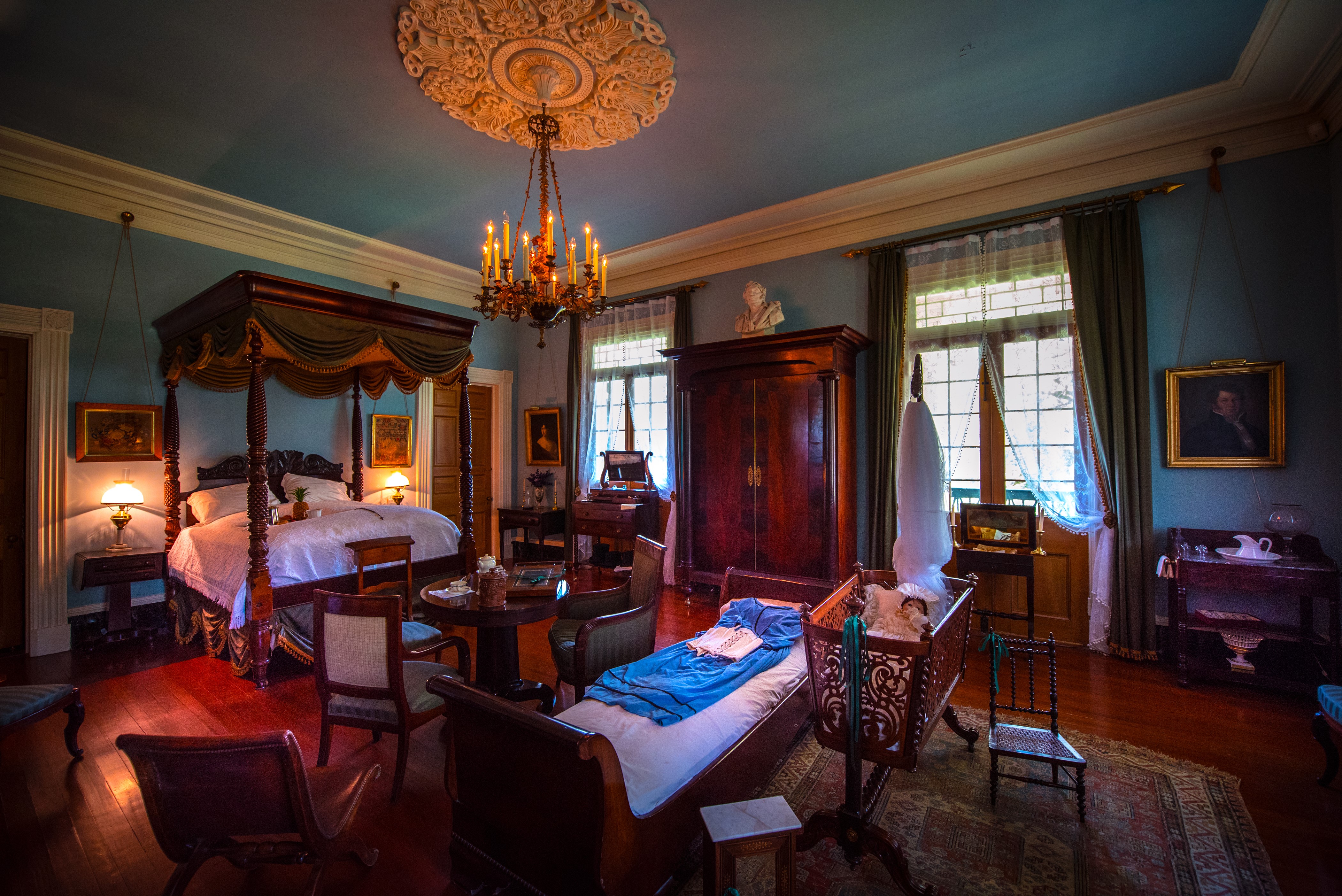 Bedroom with four-poster bed and crib HD Wallpaper