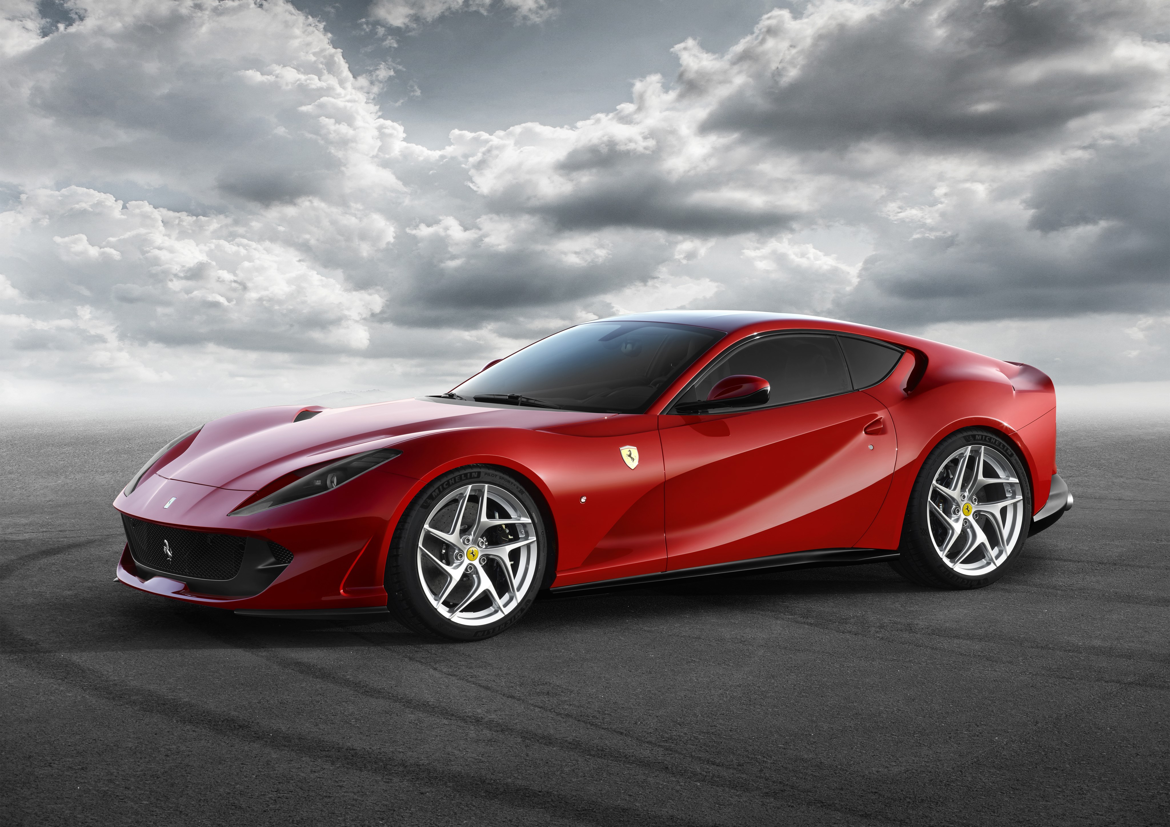 Red Ferrari 812 Superfast on asphalt HD Wallpaper