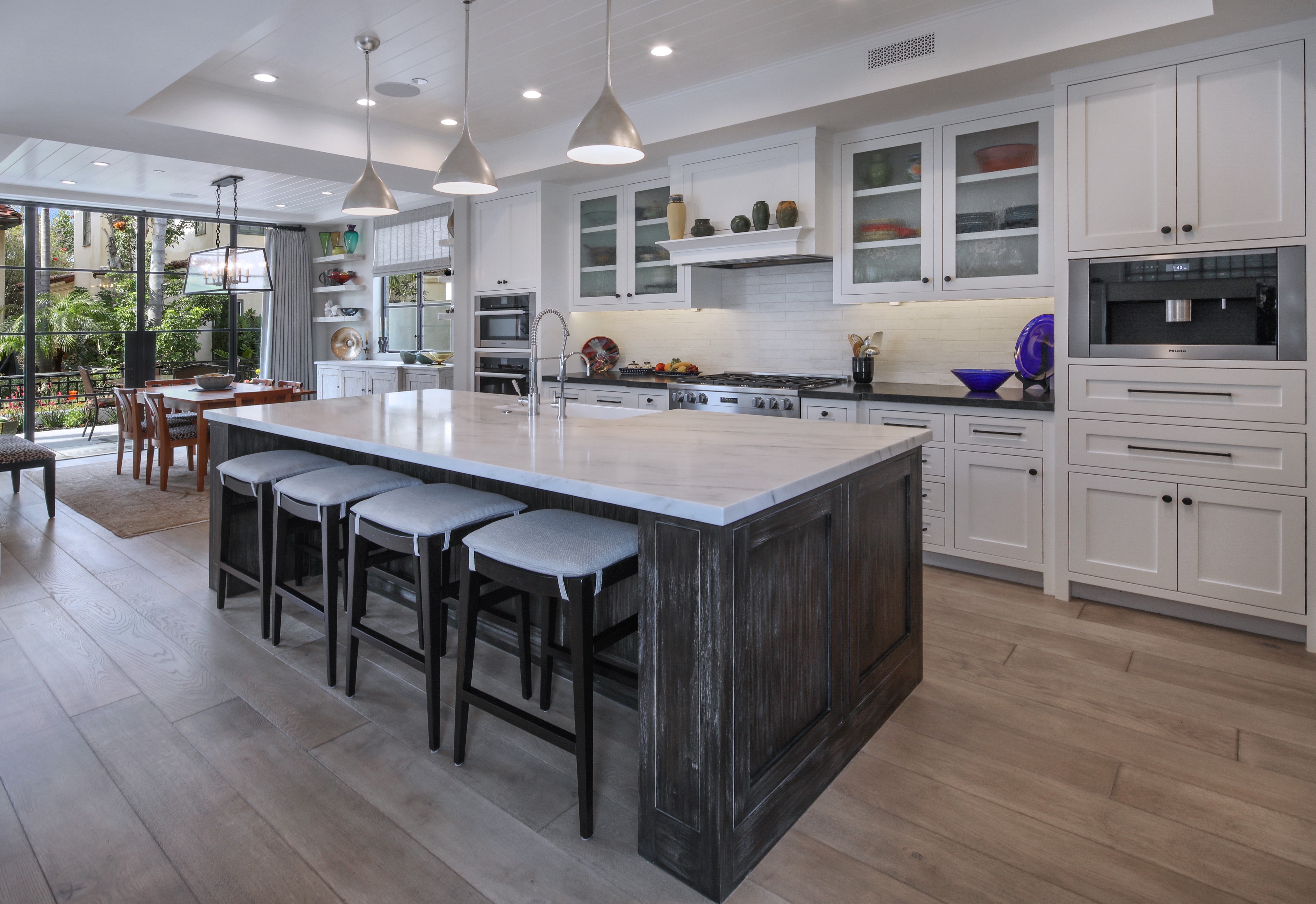 Modern Kitchen with Island and Dining Area HD Wallpaper