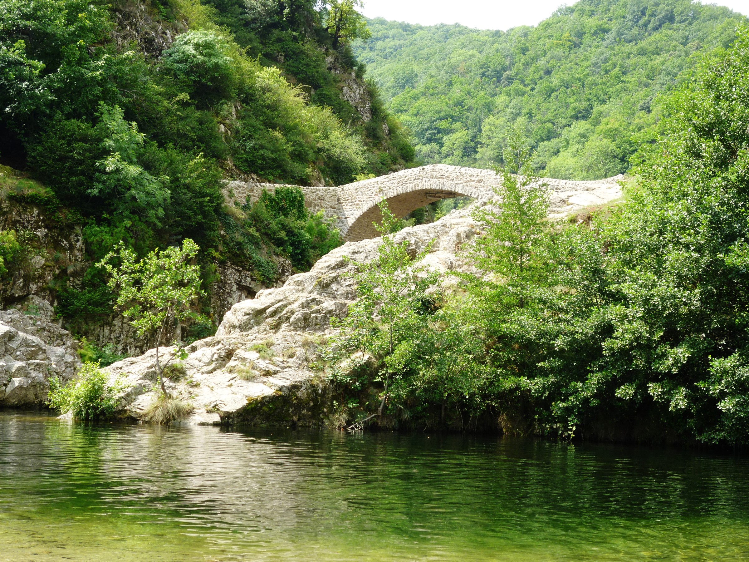 Stone bridge over a river in Ardeche, France HD Wallpaper