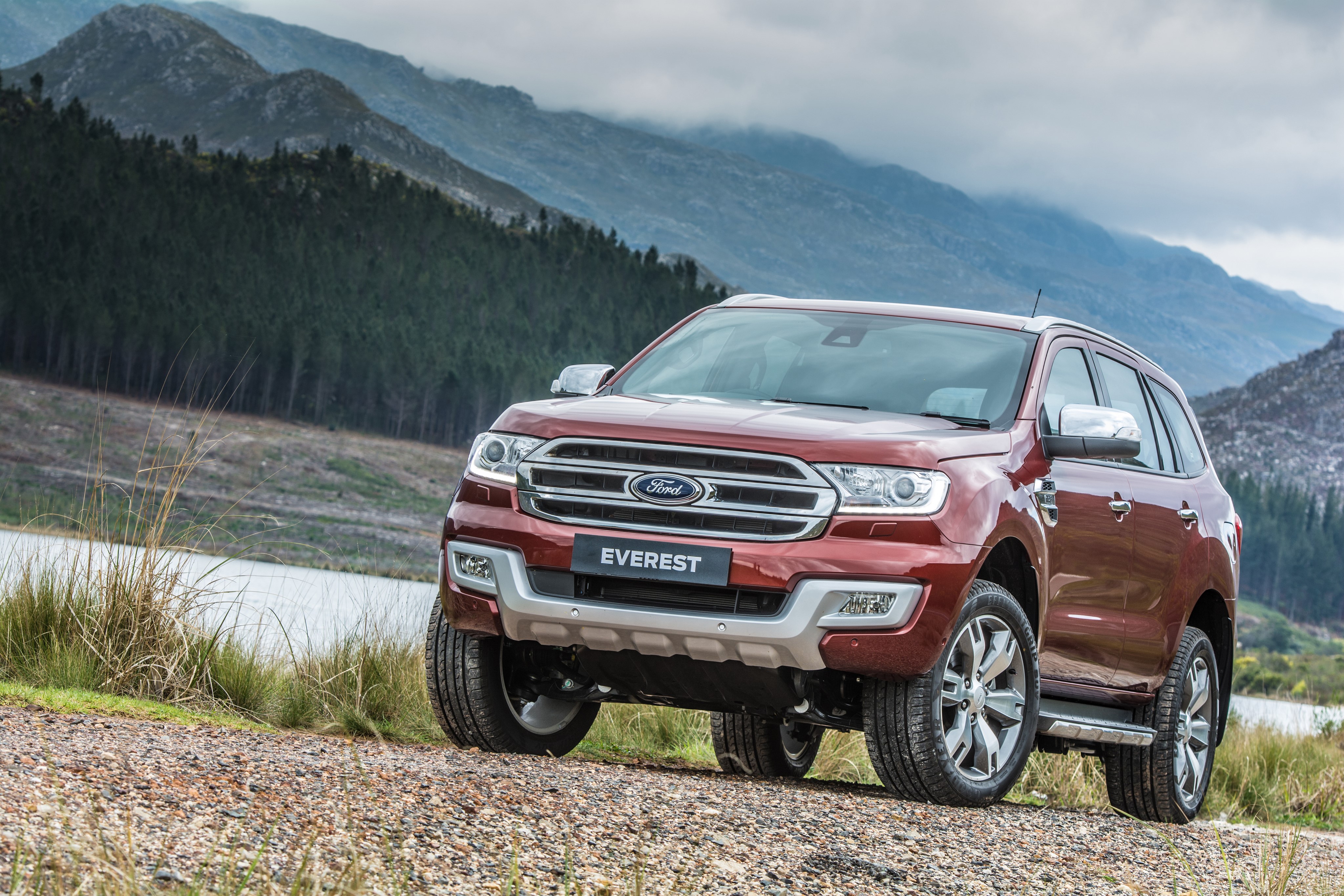Red Ford Everest SUV on a Gravel Road HD Wallpaper