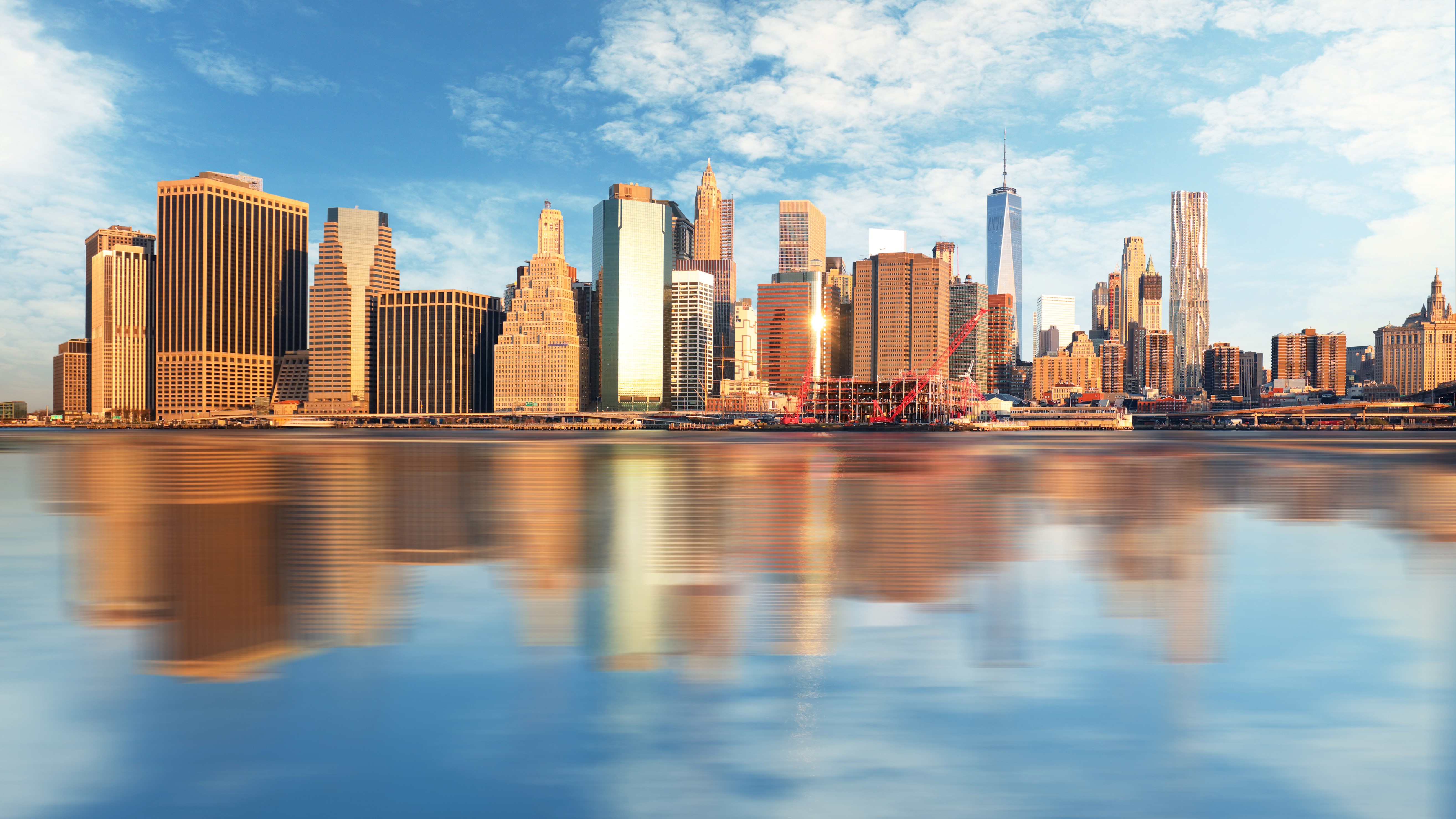 New York City skyline with reflections in water HD Wallpaper