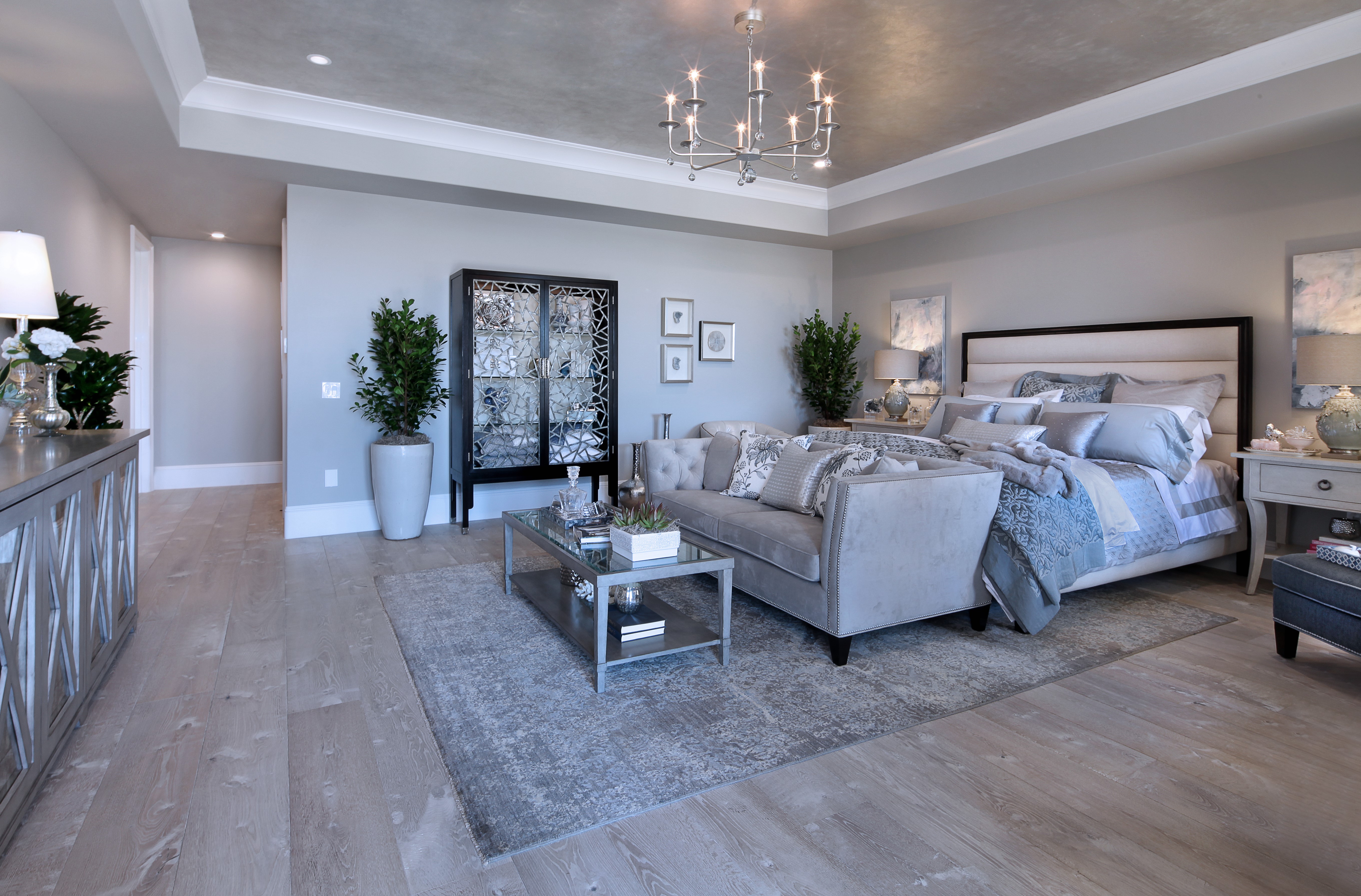 Bedroom Interior Design with Bed, Sofa, and Chandelier HD Wallpaper