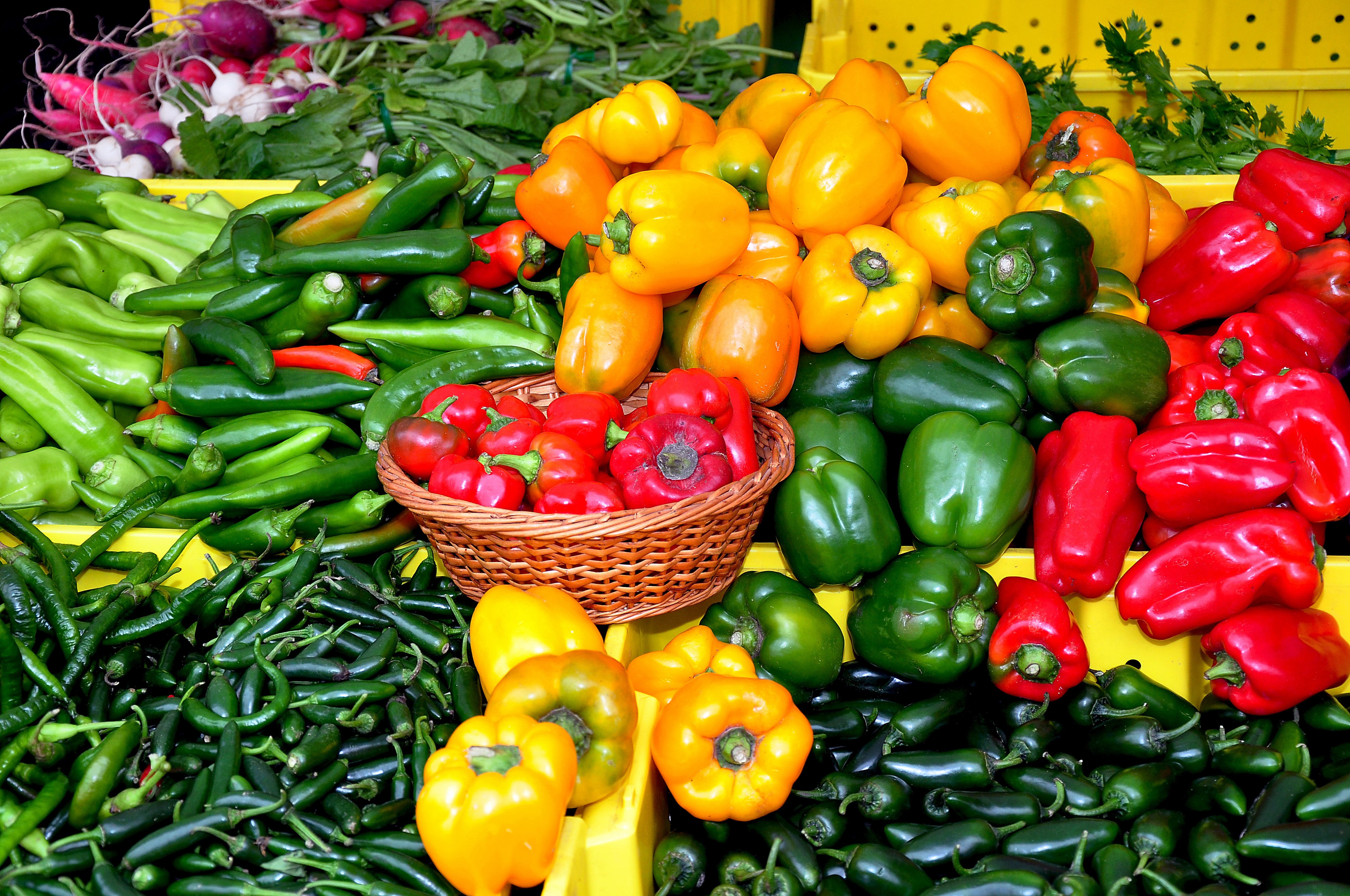 Many Bell Peppers and Chili Peppers at a Market HD Wallpaper