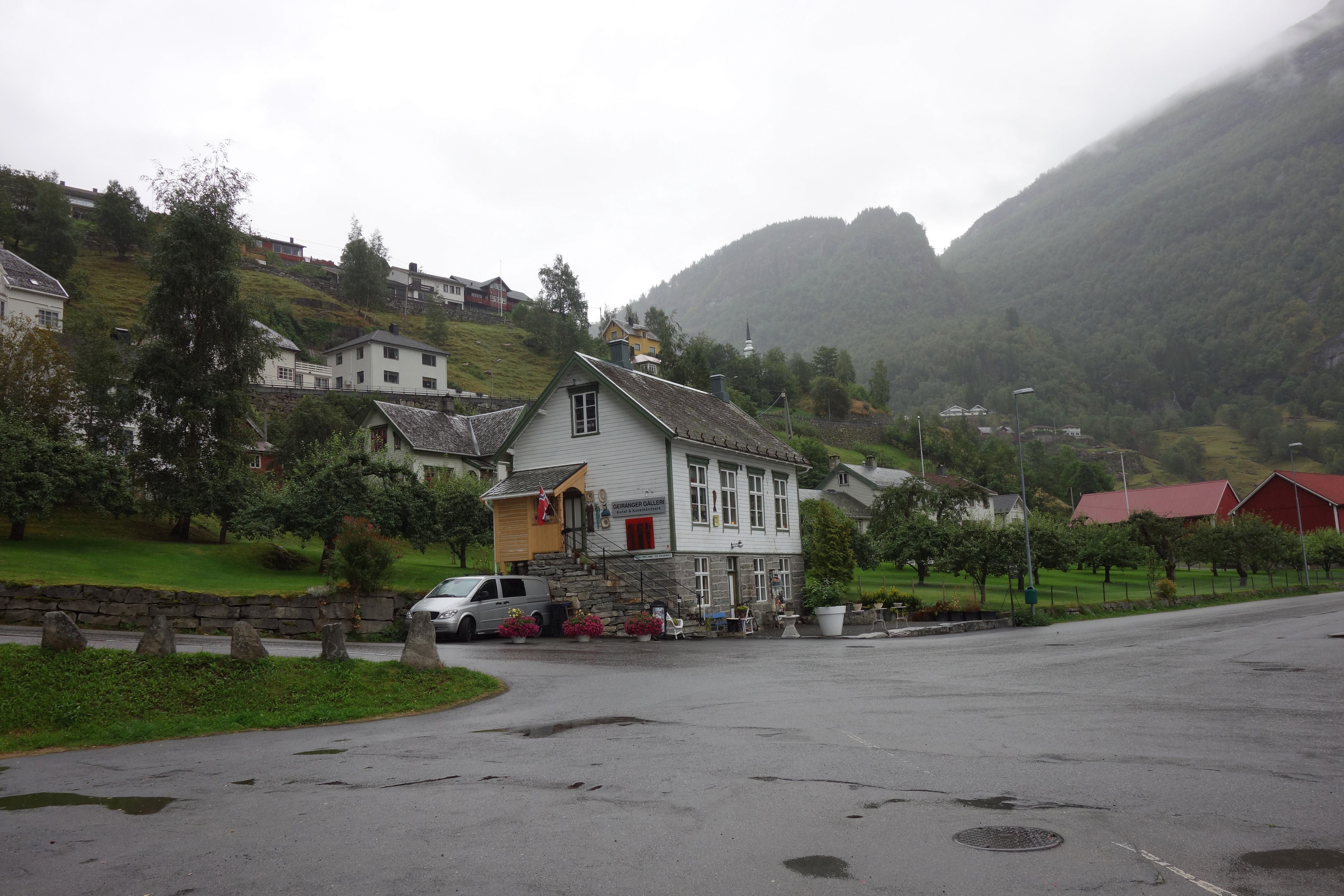 Houses and mountains in Geiranger, Norway HD Wallpaper