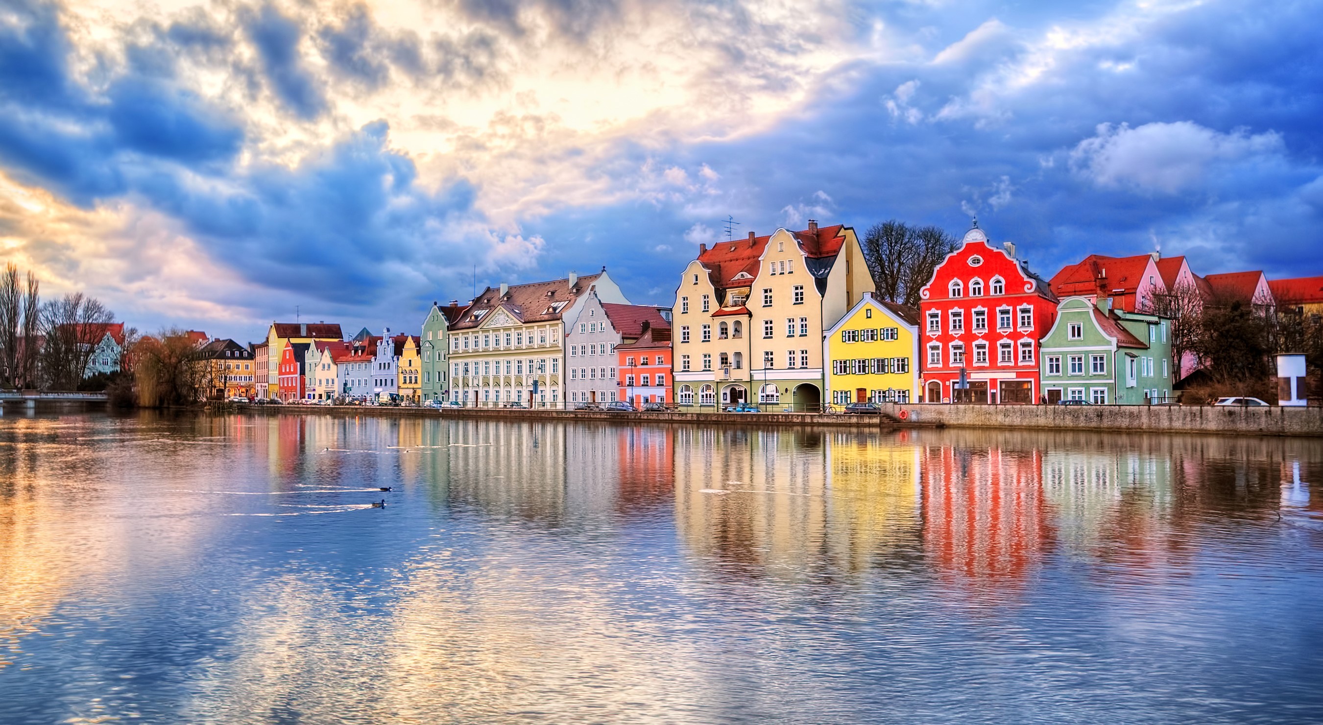Colorful buildings on a river in Landshut, Germany HD Wallpaper