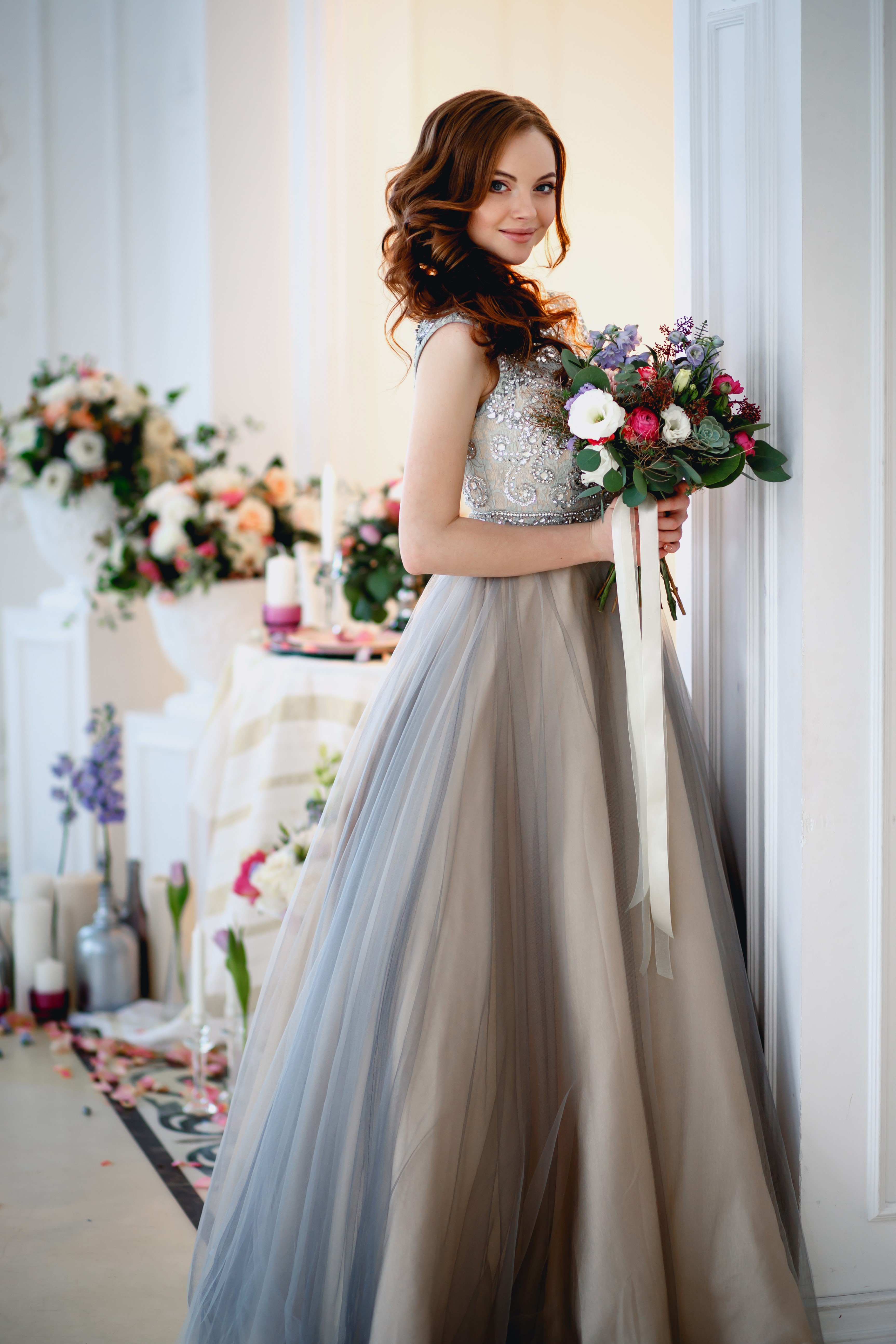 Woman in a formal dress holding a bouquet HD Phone Wallpaper