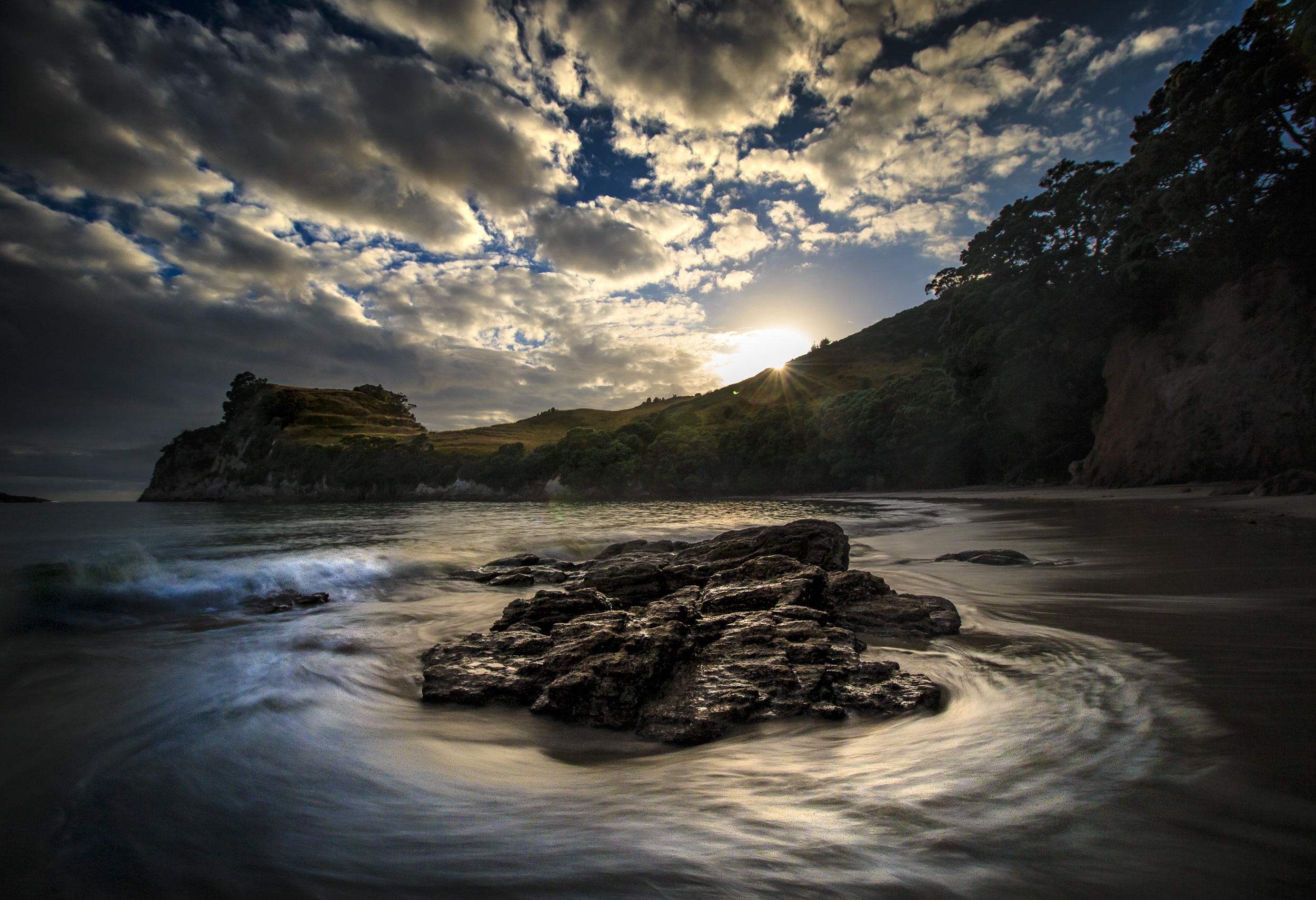 Sunset over a rocky coast in Tasman, New Zealand HD Wallpaper