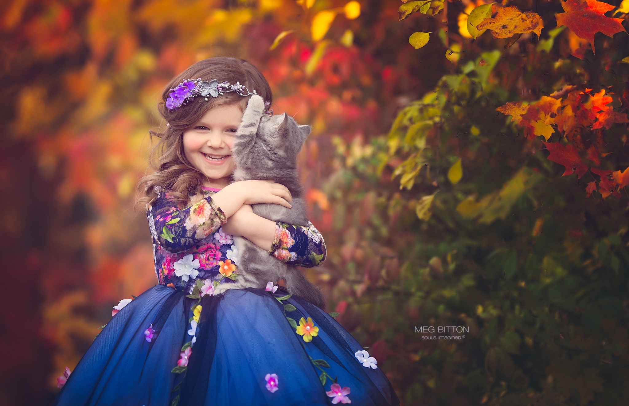 Girl in floral dress holding a cat HD Wallpaper