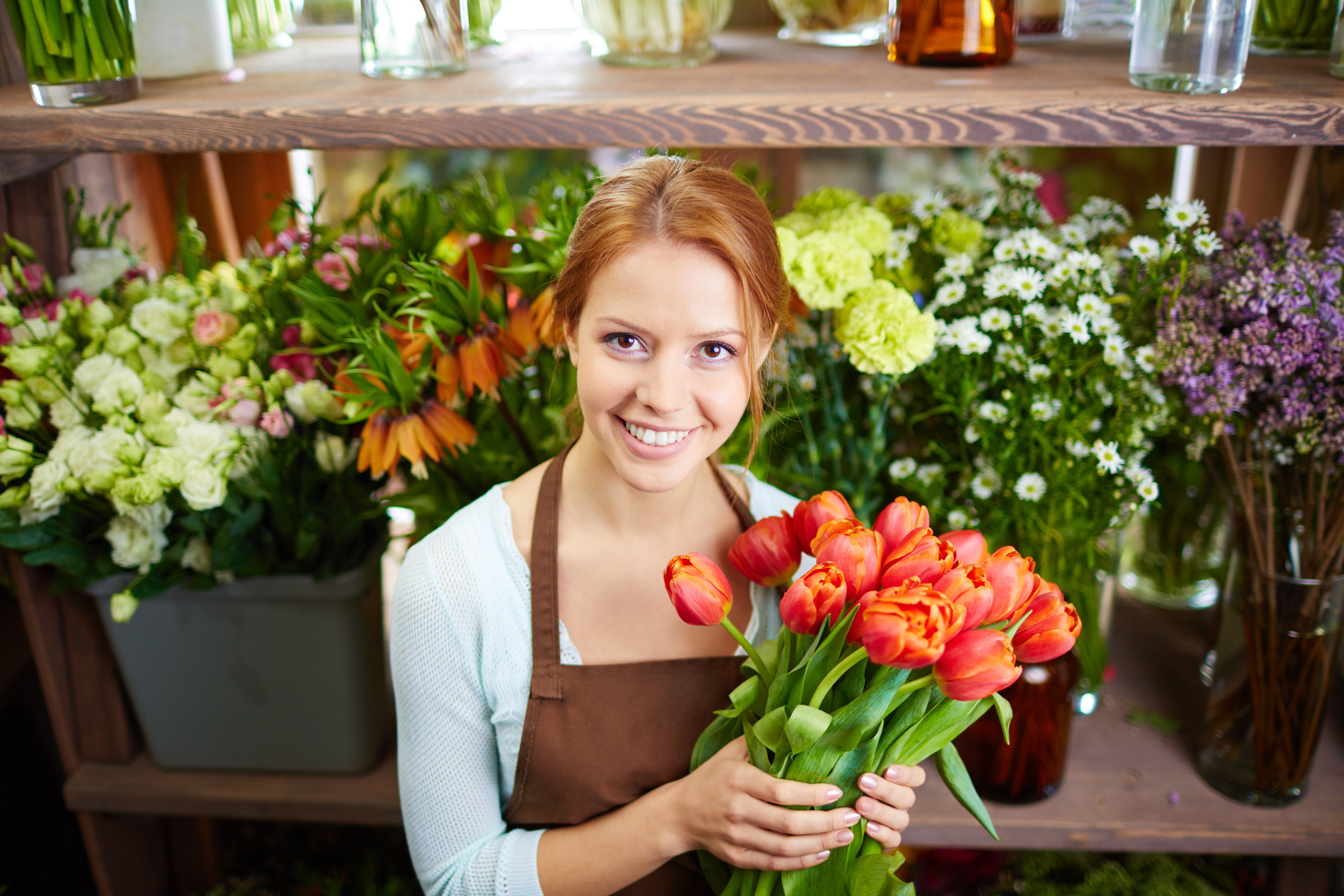 Redhead florist holding tulips HD Wallpaper
