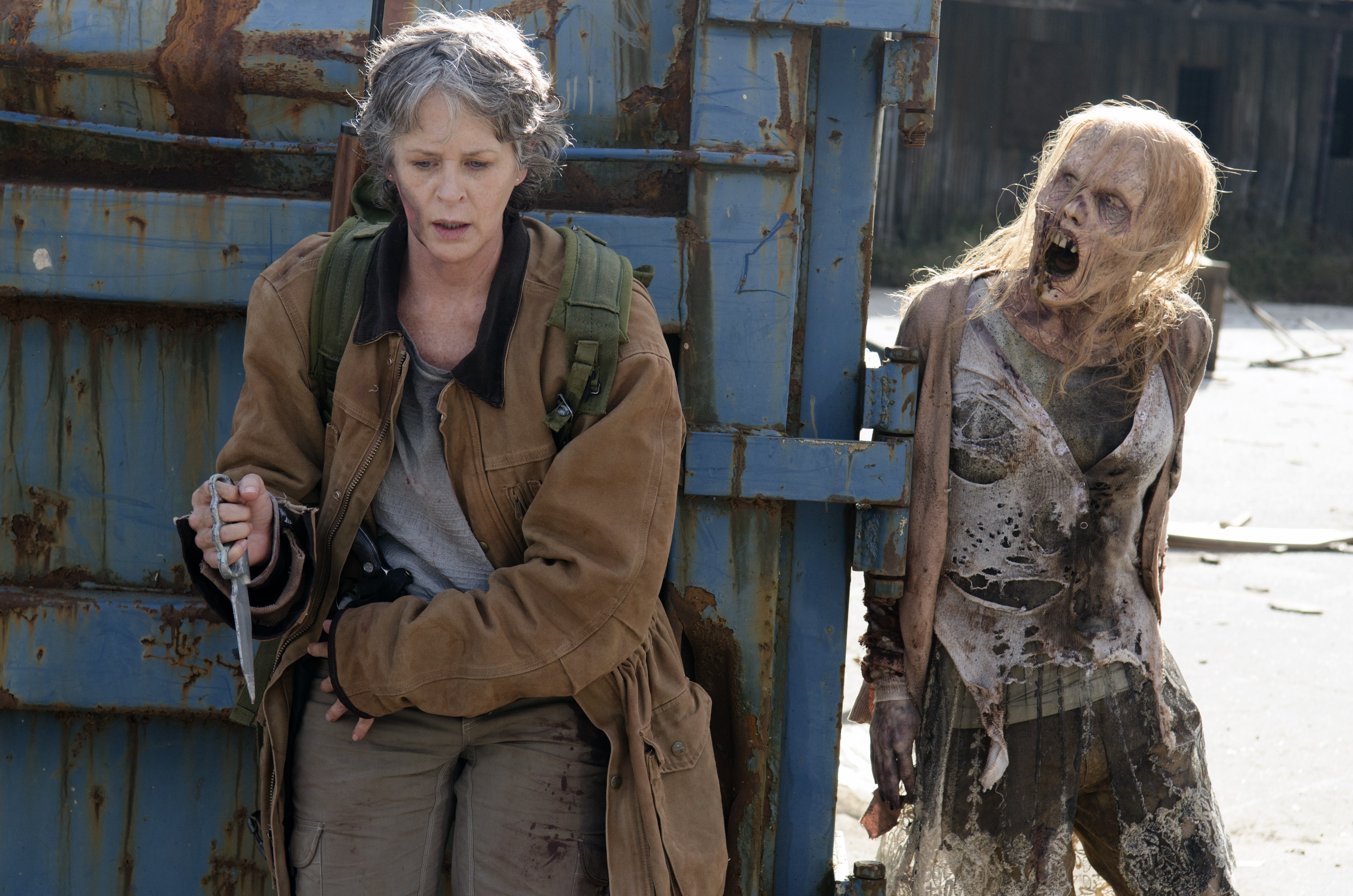 Carol from The Walking Dead TV with a zombie HD Wallpaper