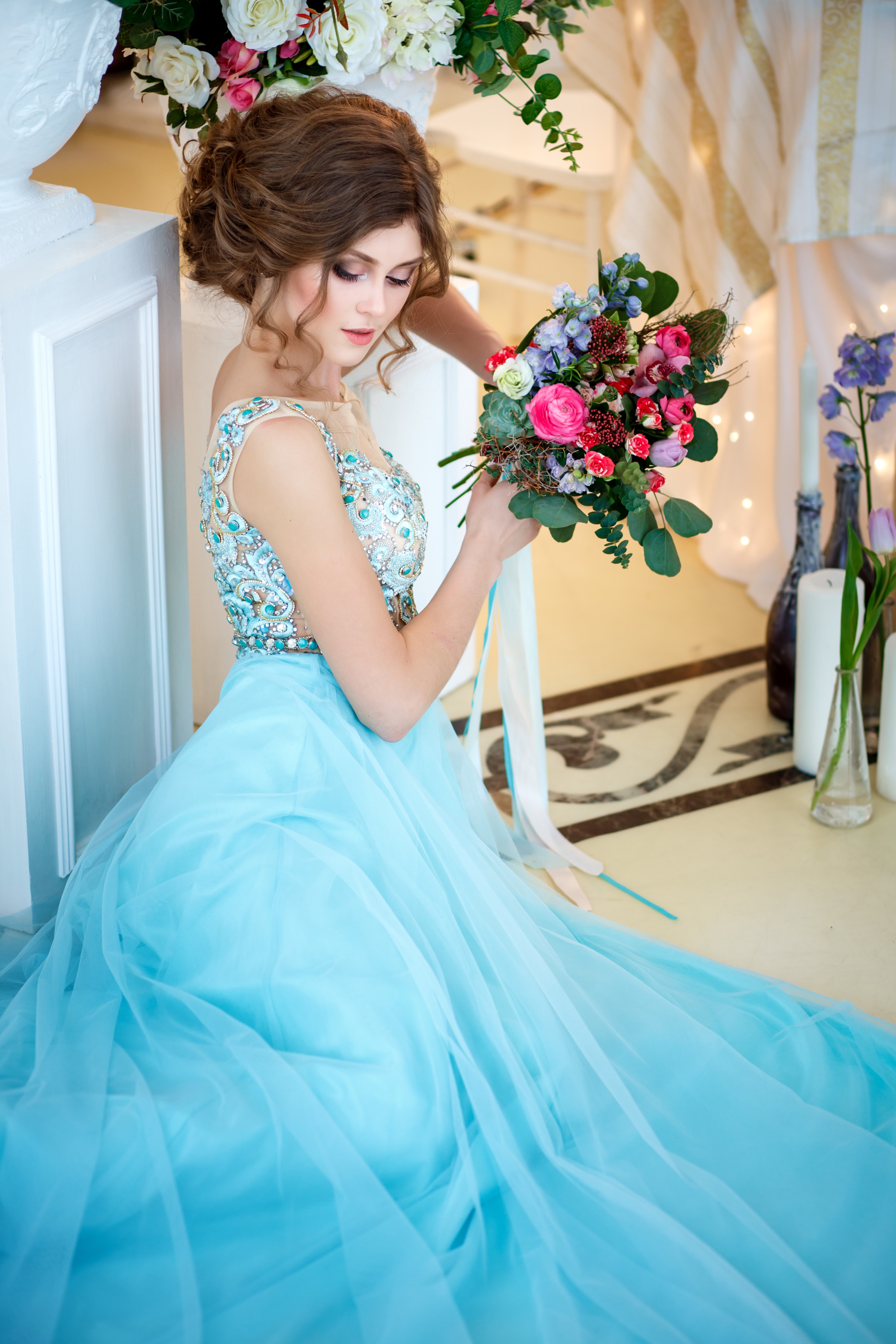 Woman in blue dress holding a bouquet HD Phone Wallpaper