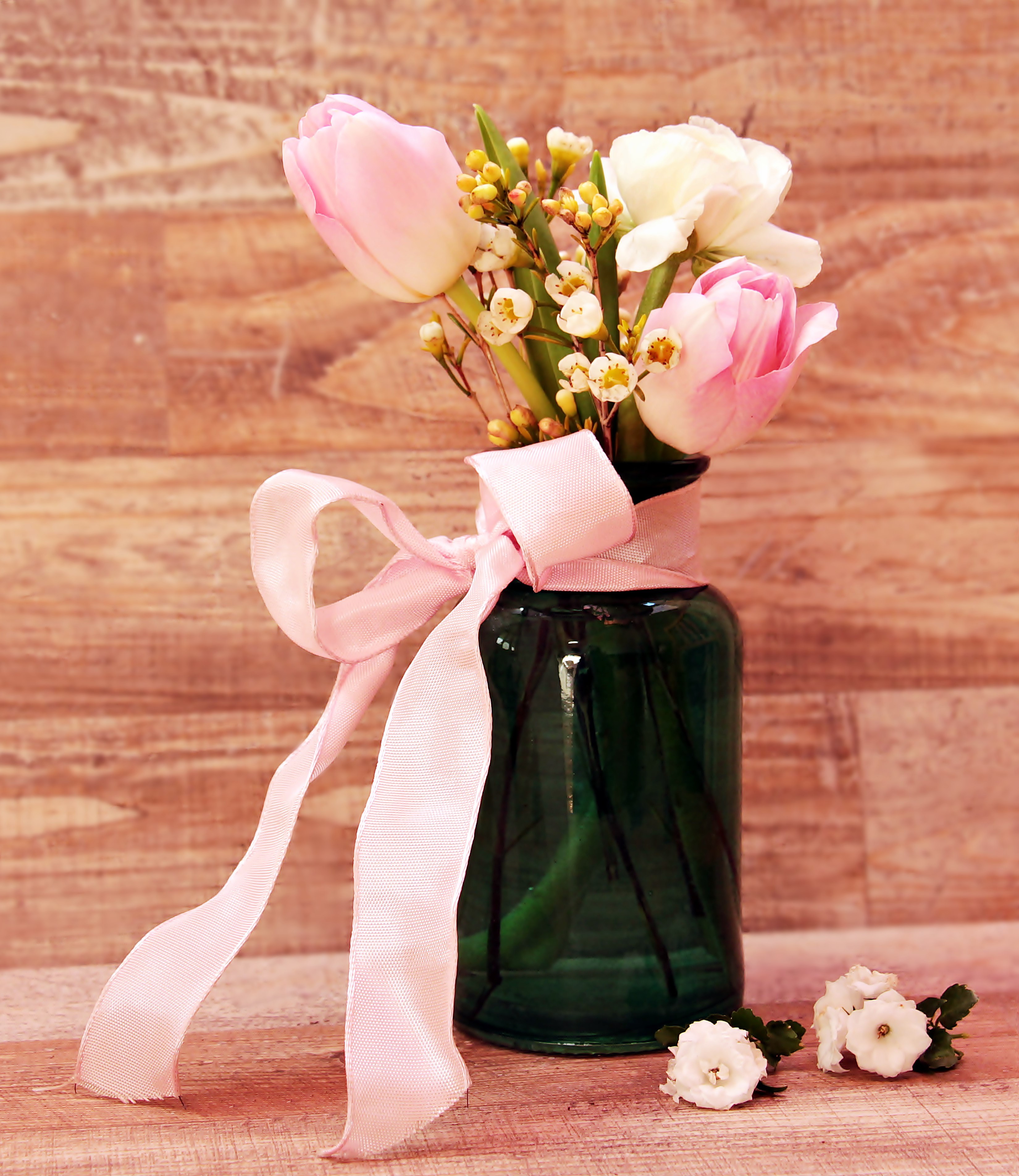 Pink and white tulips in a green vase with a pink bow HD Wallpaper