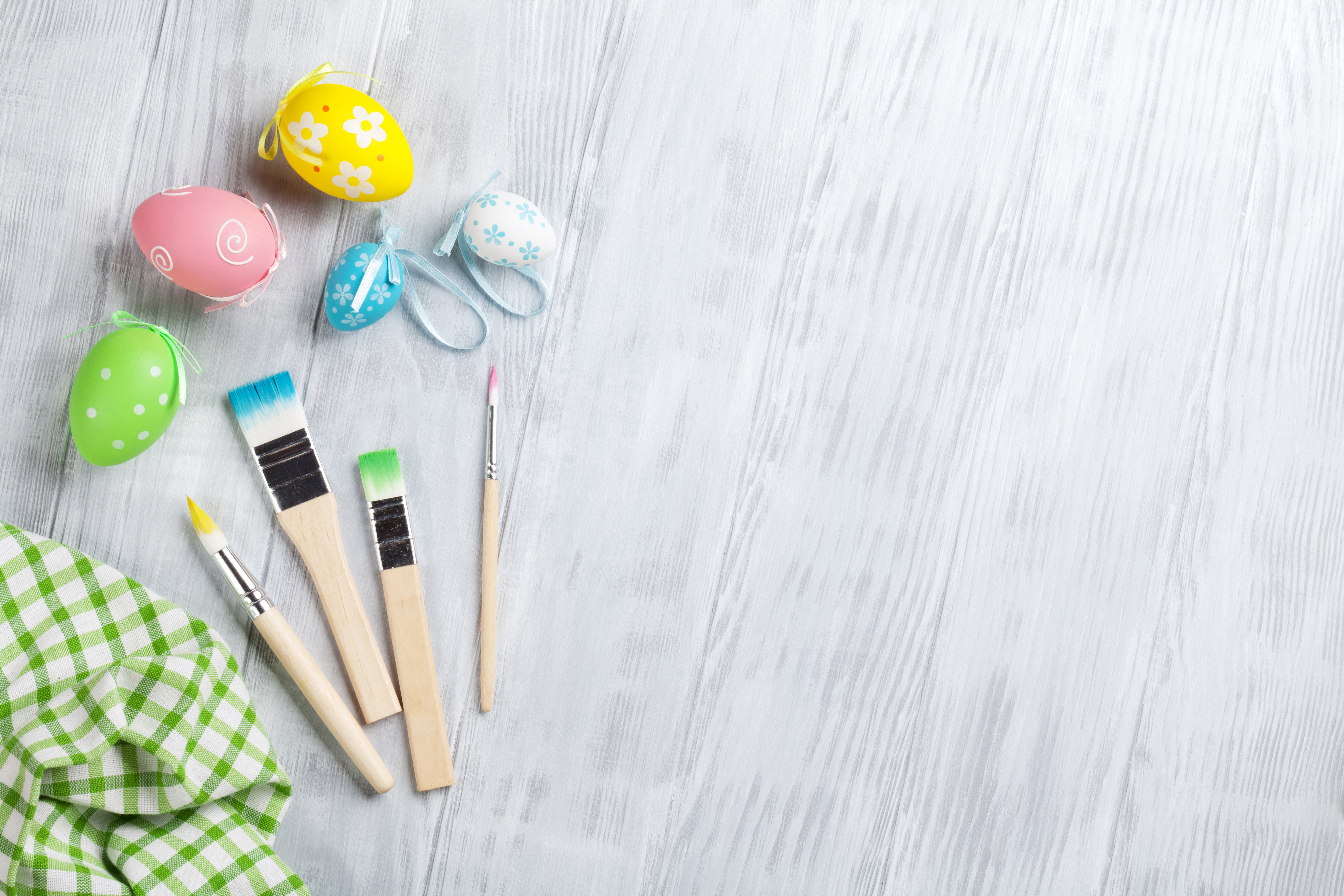Easter Eggs and Paintbrushes on Wood Planks HD Wallpaper