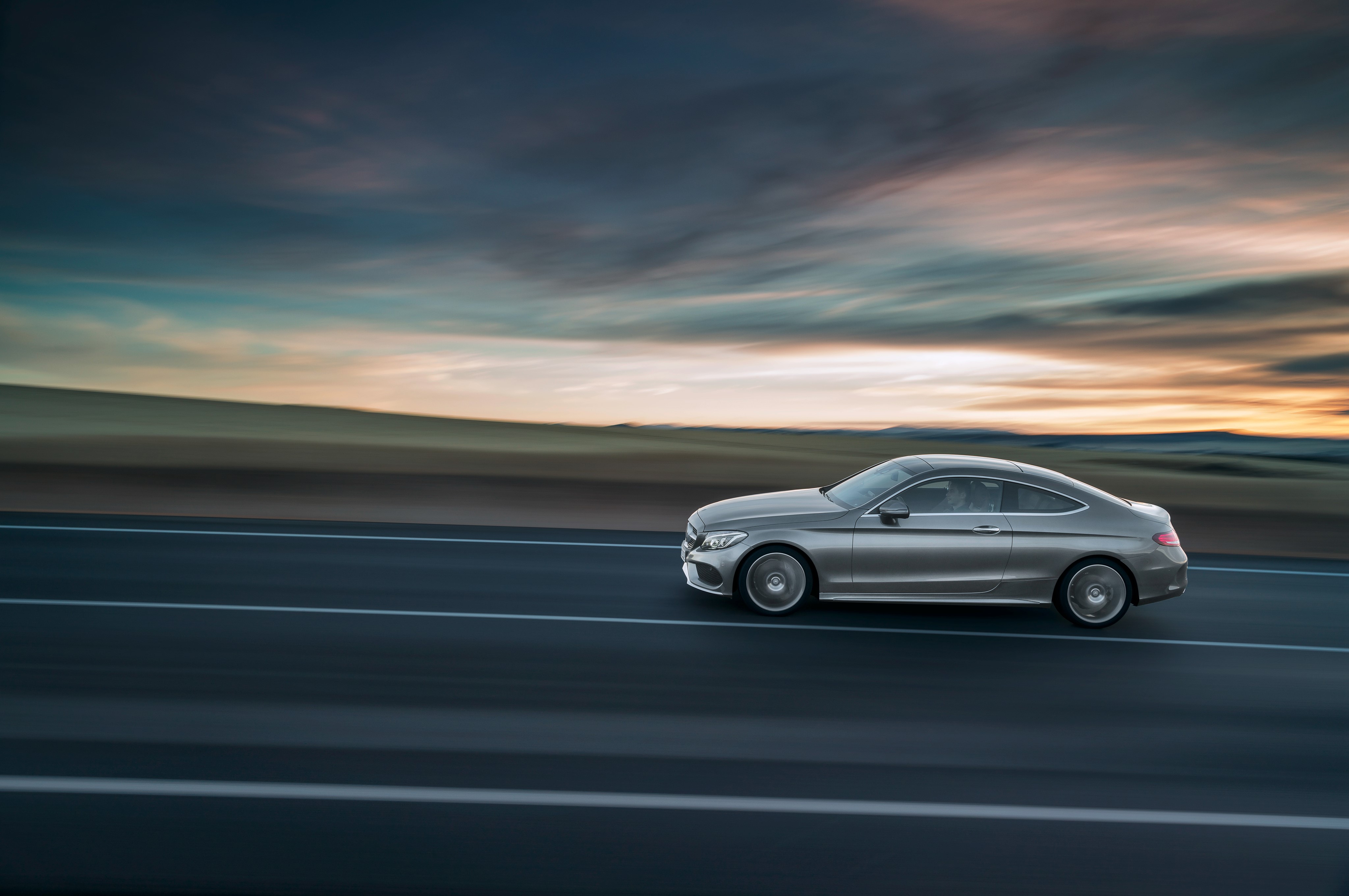4K Mercedes-Benz C-Klasse Coupe in motion HD Wallpaper