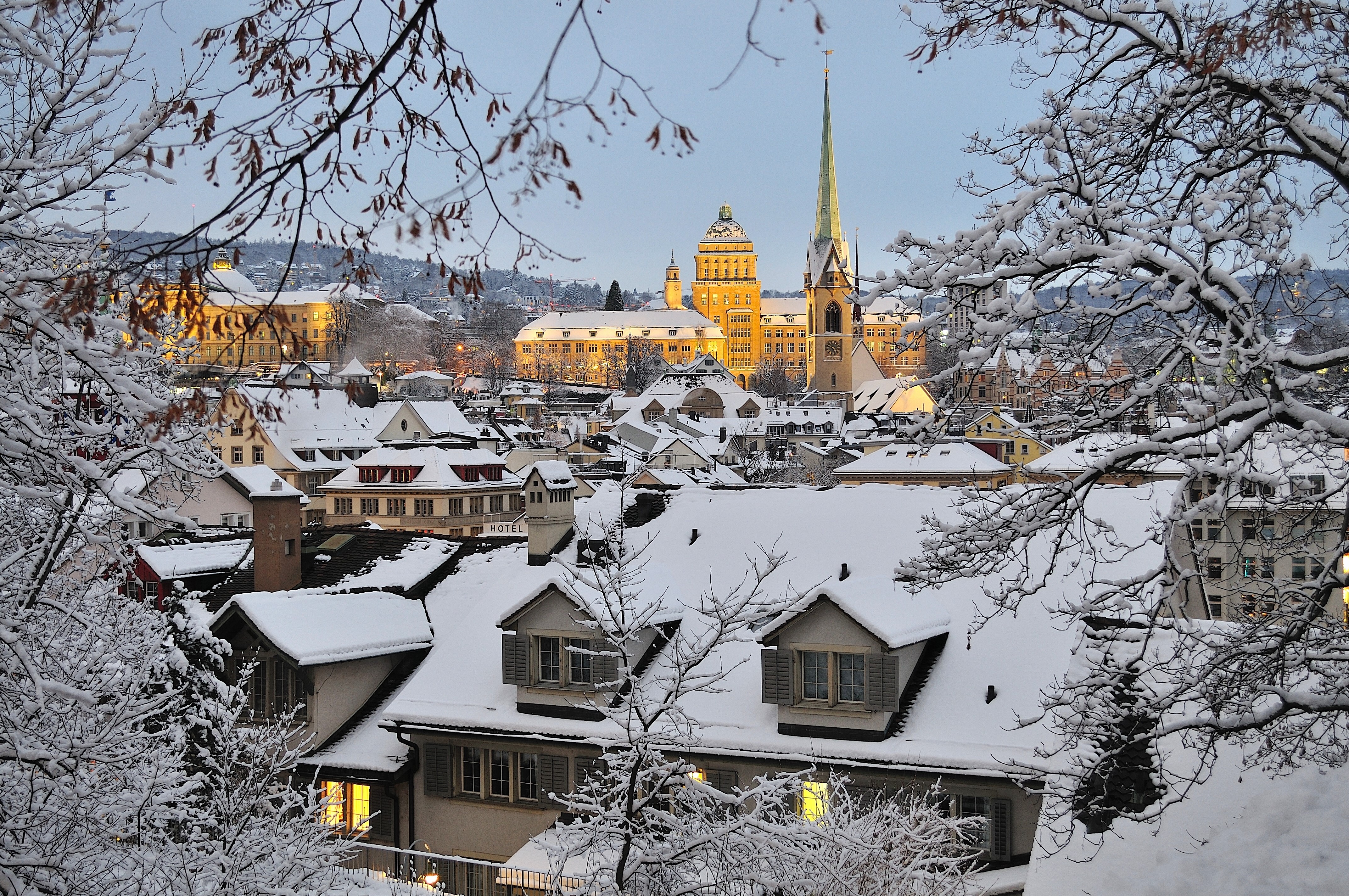 Zurich, Switzerland in Winter with Snow on Roofs HD Wallpaper
