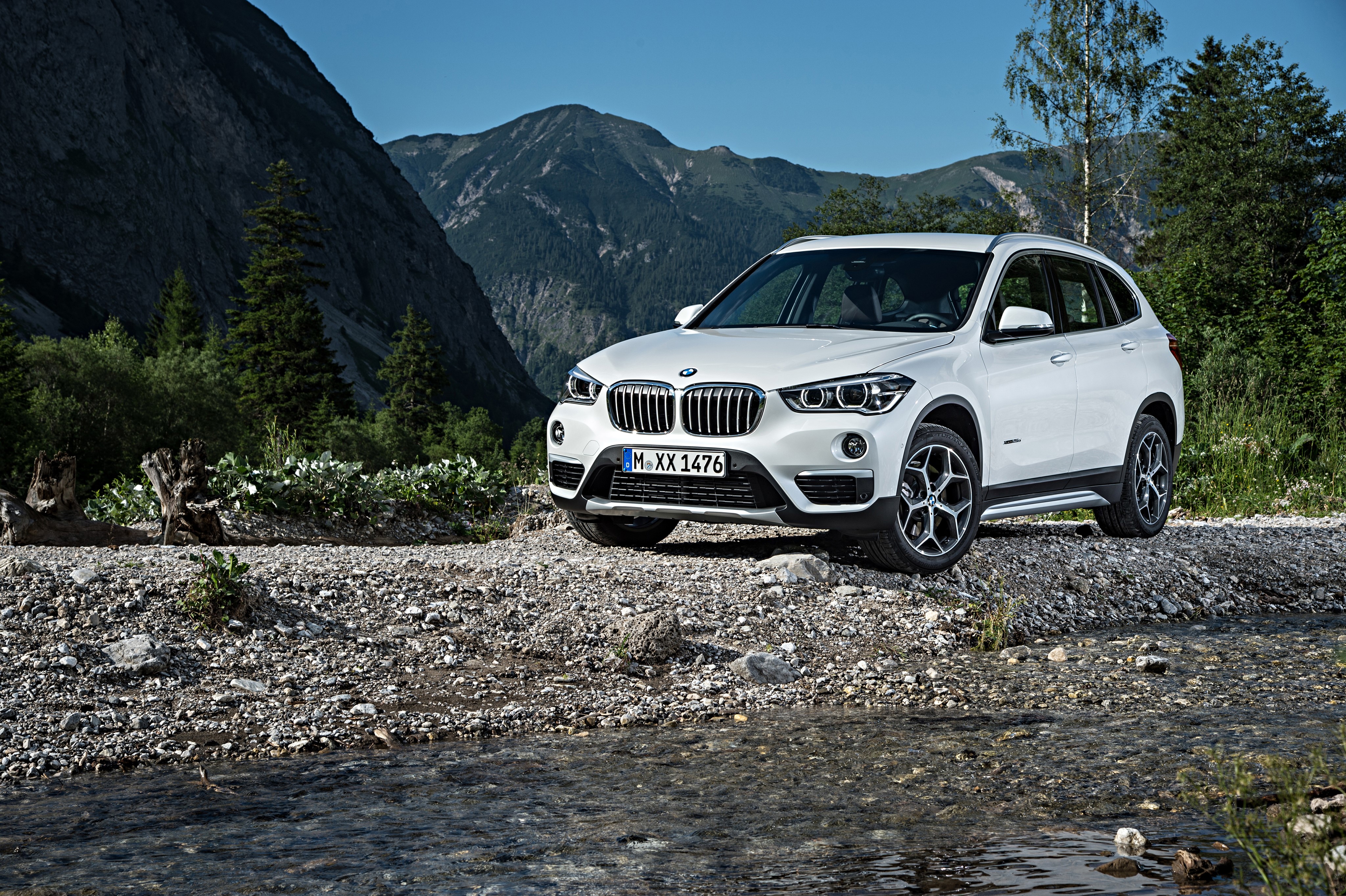 White BMW X1 xDrive F48 on Stones HD Wallpaper