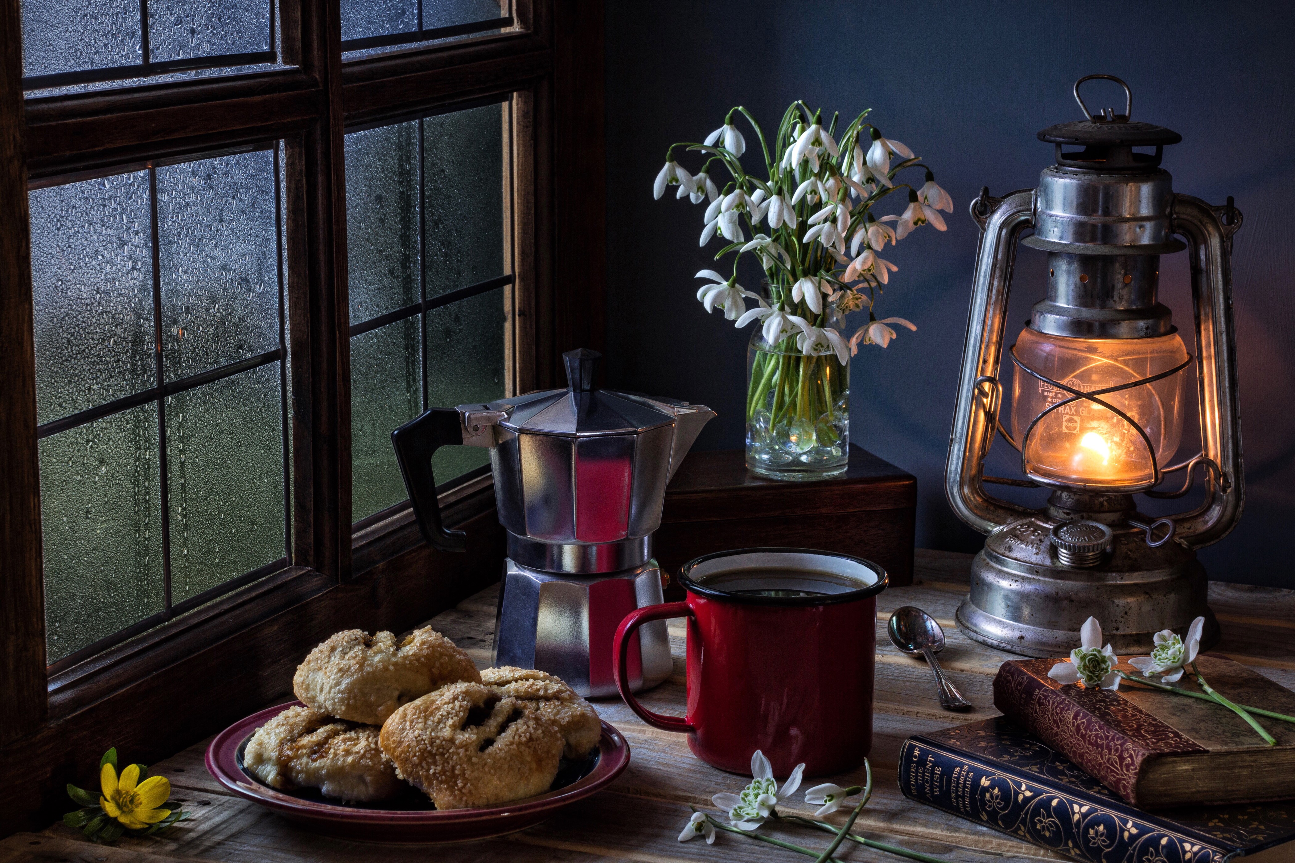 Still-life with kerosene lamp, snowdrops, coffee, and pastries HD Wallpaper