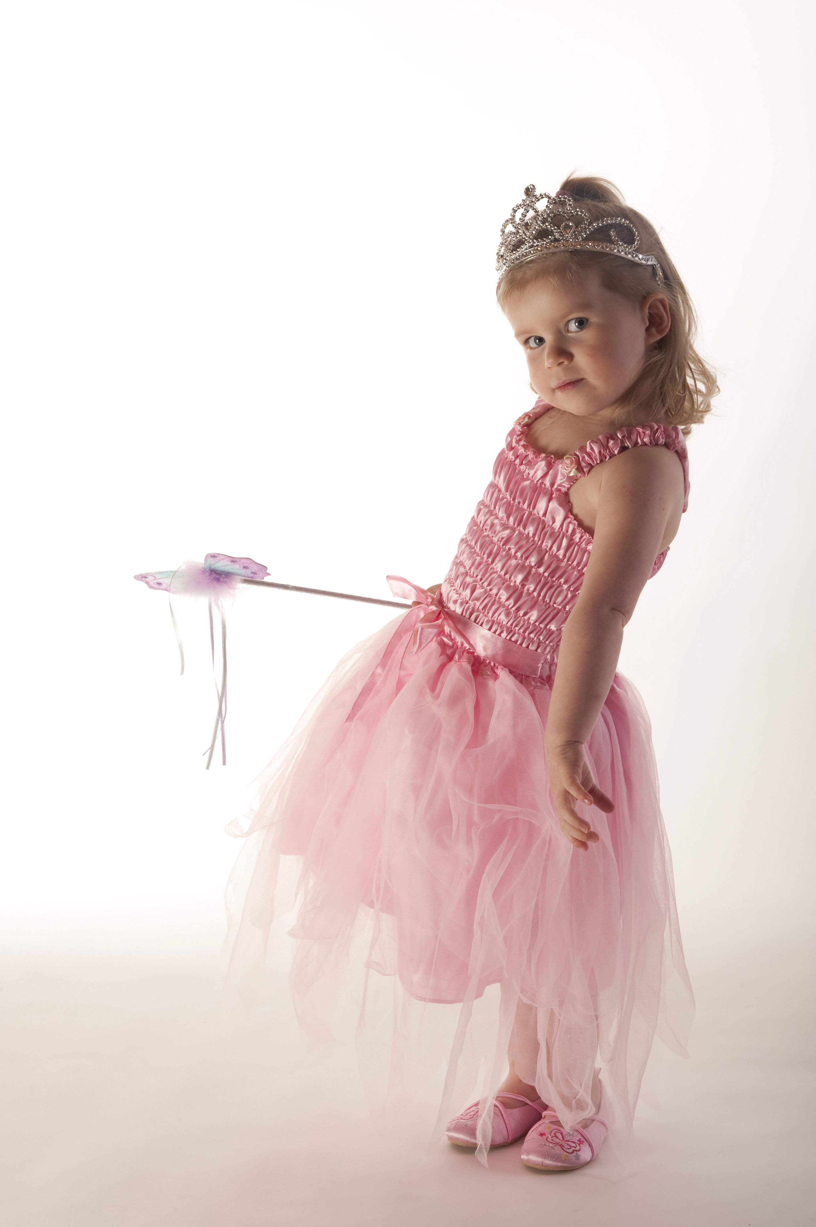 Girl in a pink princess dress with a crown and wand HD Phone Wallpaper